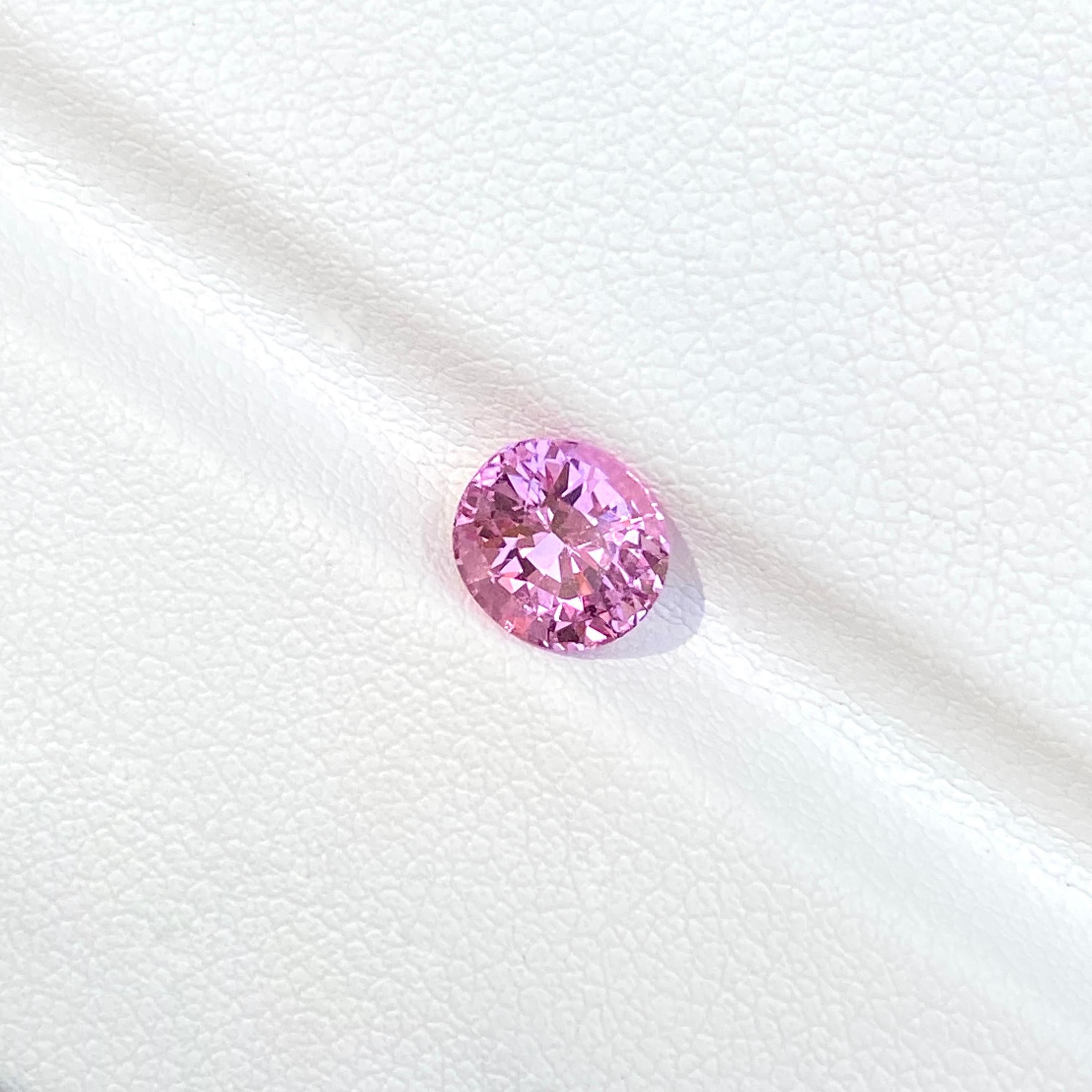 Seductive pink sapphire reflecting vivid fuchsia from this oval cut gemstone of 1.5 carat.  A natural, certified unheated spectacular pink sapphire from Ceylon - a rare beauty of such high calibre.

This pink sapphire is available to purchase as a