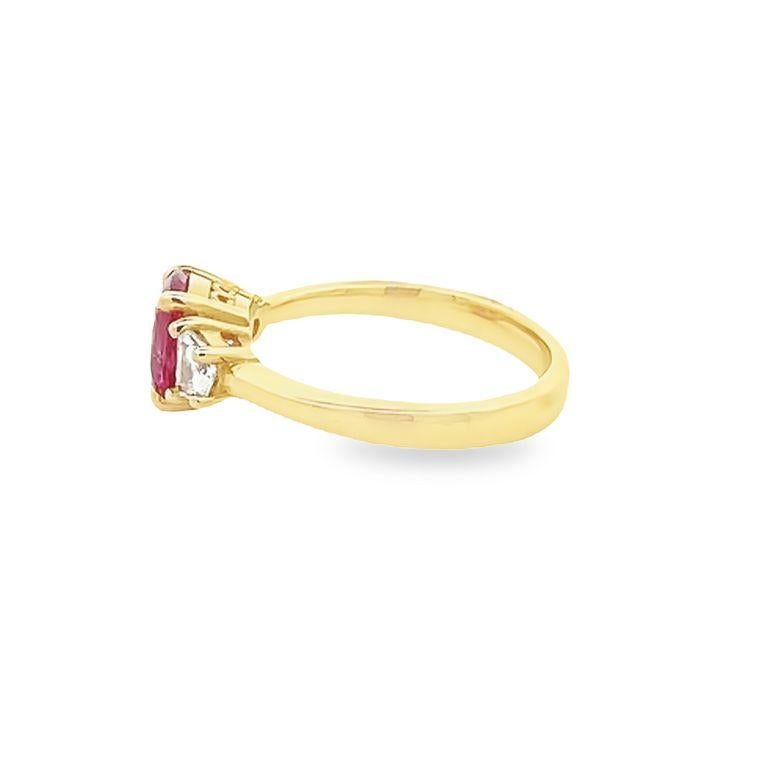 This stunning ring is a beautiful symbol of your love and commitment. Its centerpiece is a GIA-certified no-heat pink sapphire gemstone weighing 1.74 carats and surrounded by two gorgeous white Cadillac diamonds weighing 0.39. The ring is made of