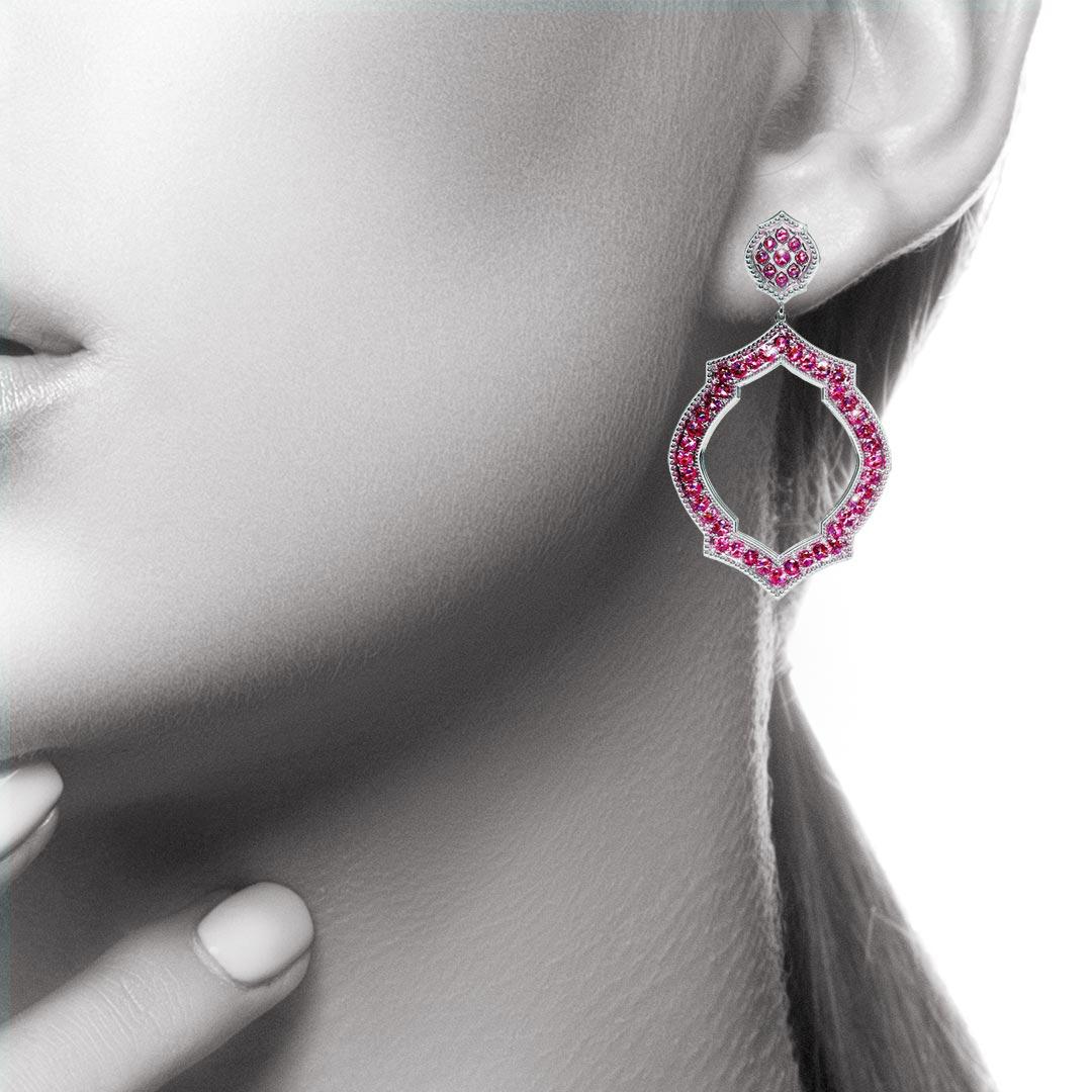 Part of the brand new 'Mauresque' collection by Natalie Barney, these drop earrings feature 98 Pink Sapphires with a total weight of 3.32 carats in an unusual Moorish inspired shape. Unique and stunning, wear them to a special event or every