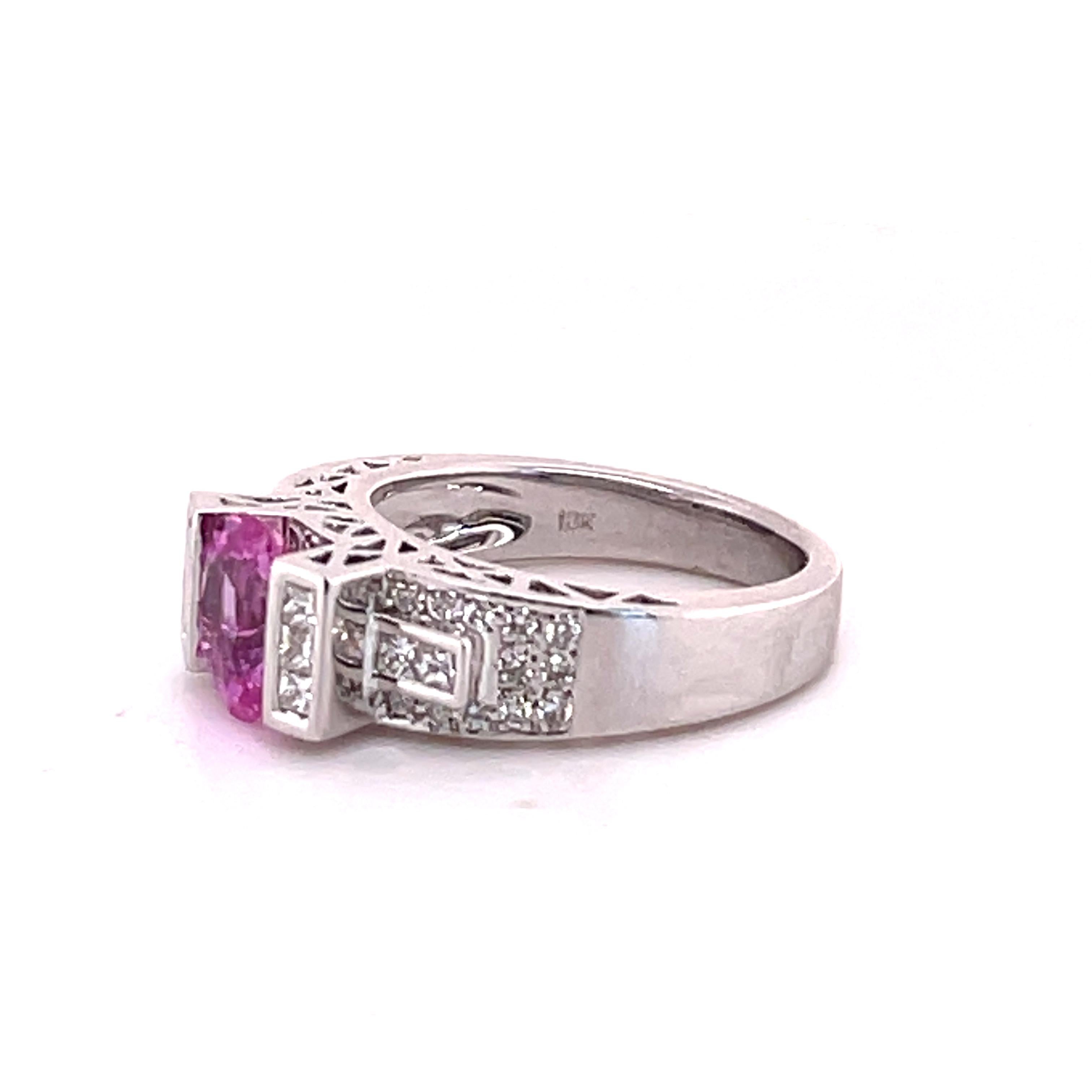Sapphire is a wonderful gemstone to be worn daily, due to the Mohs' hardness of 9. This lovely oval light pink Sapphire is set in a unique modern setting that looks lovely on any hand. 
The ring is done in 18-karat white gold, stamped 750.
The 10
