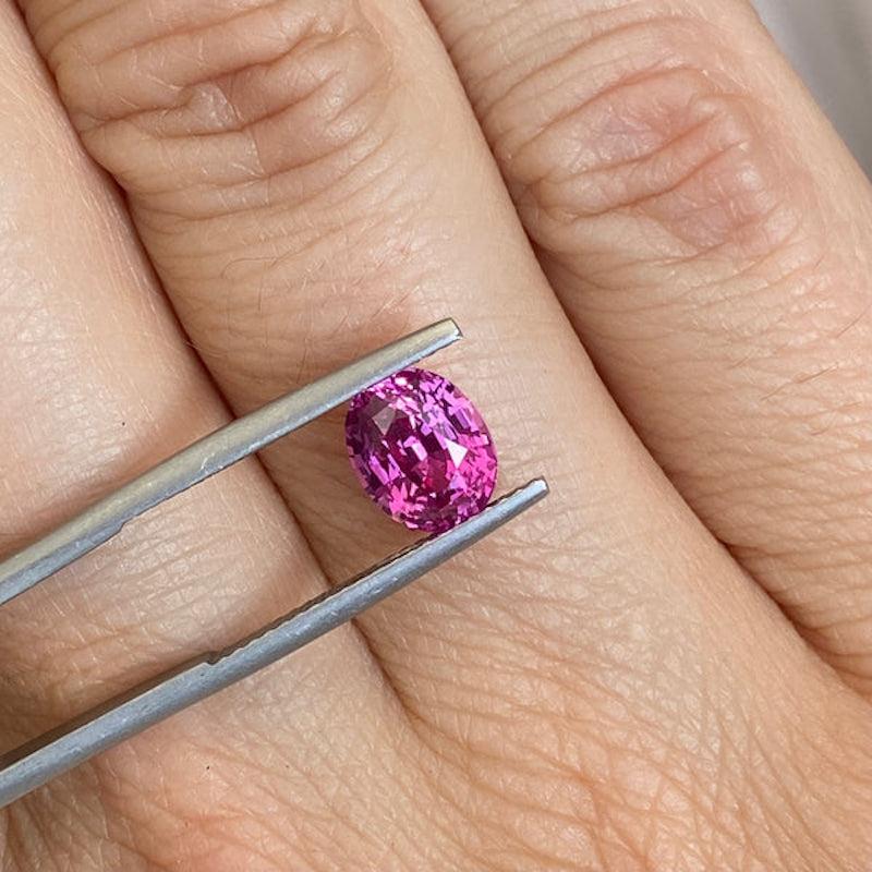 A hypnotic oval pink sapphire with a colour rating of 