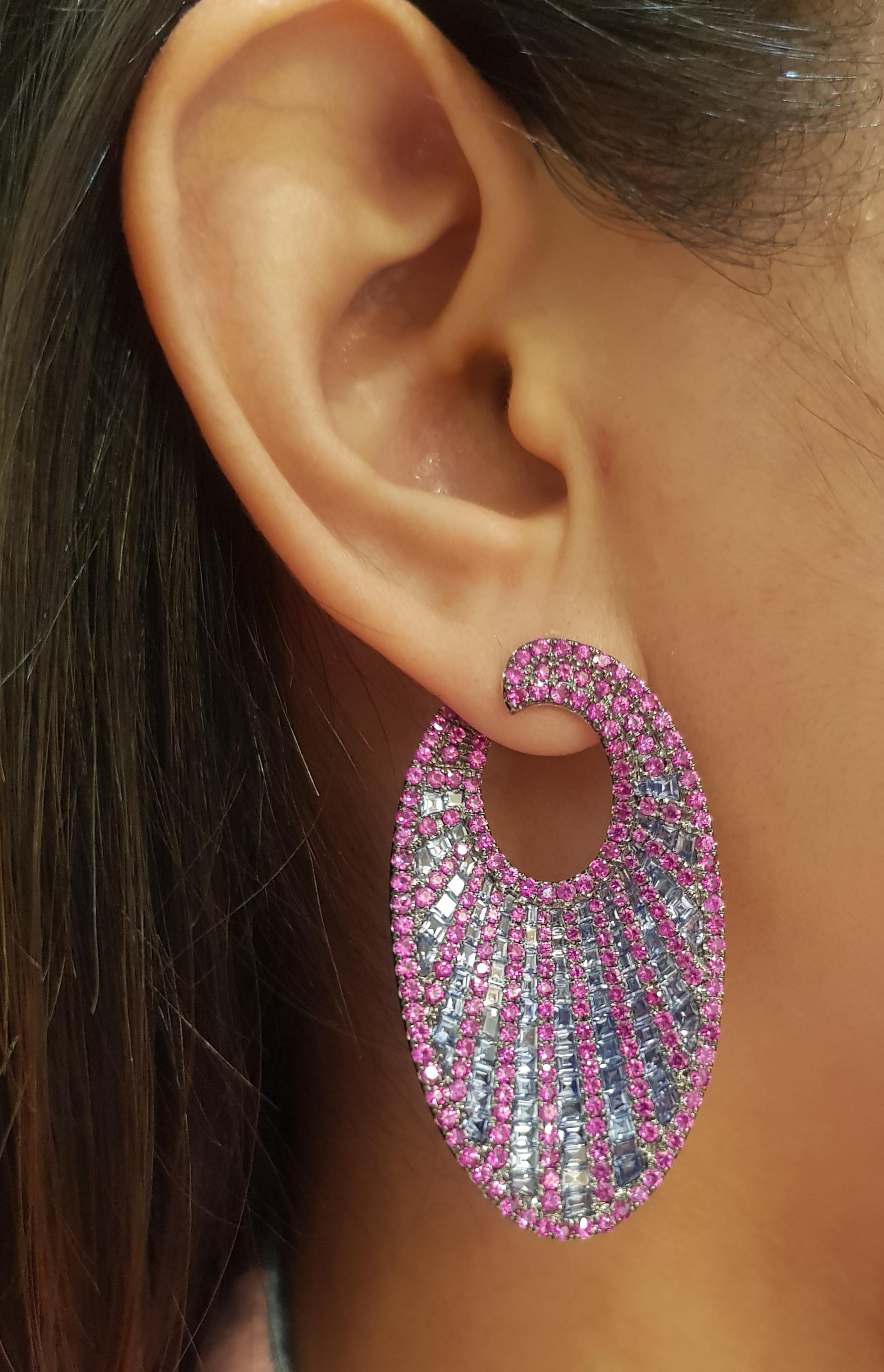 Pink Sapphire 7.22 carats and Blue Sapphire 19.97 carats Earrings set in 14K White Gold Settings

Width: 2.8 cm 
Length: 5.0 cm
Total Weight: 25.2 grams

