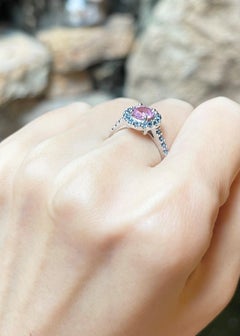Pink Sapphire and Blue Sapphire Ring set in 18K White Gold Settings
