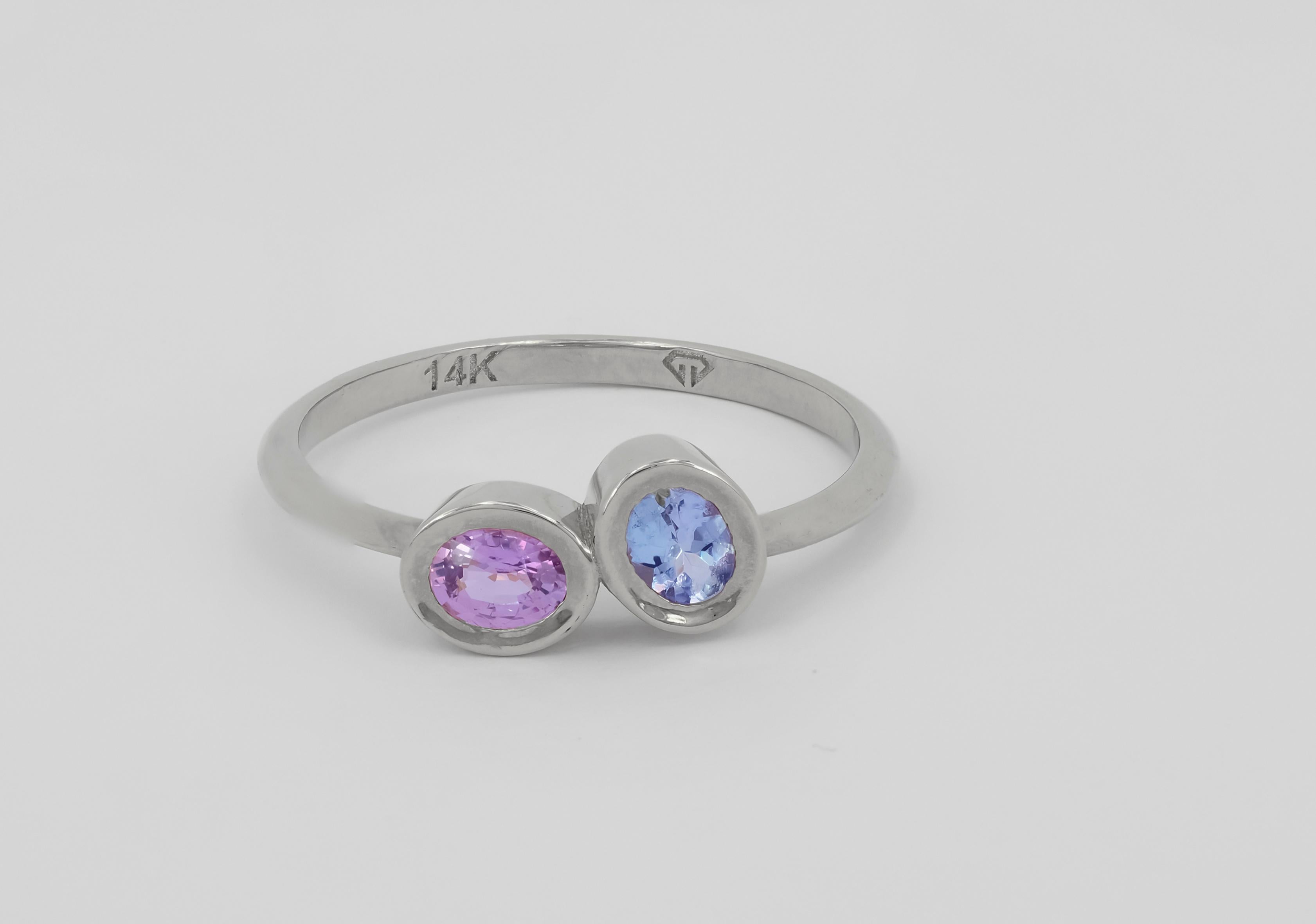 Pink sapphire and blue tanzanite 14k gold ring. Two gemstone ring. Tanzanite and sapphire ring. Bezel set tanzanite, sapphire ring. 

Metal: 14 gold
Weight: 2 g. depends from size

Set with tanzanite  
Color - violet-blue 
Oval cut, aprx 0.6 ct. in