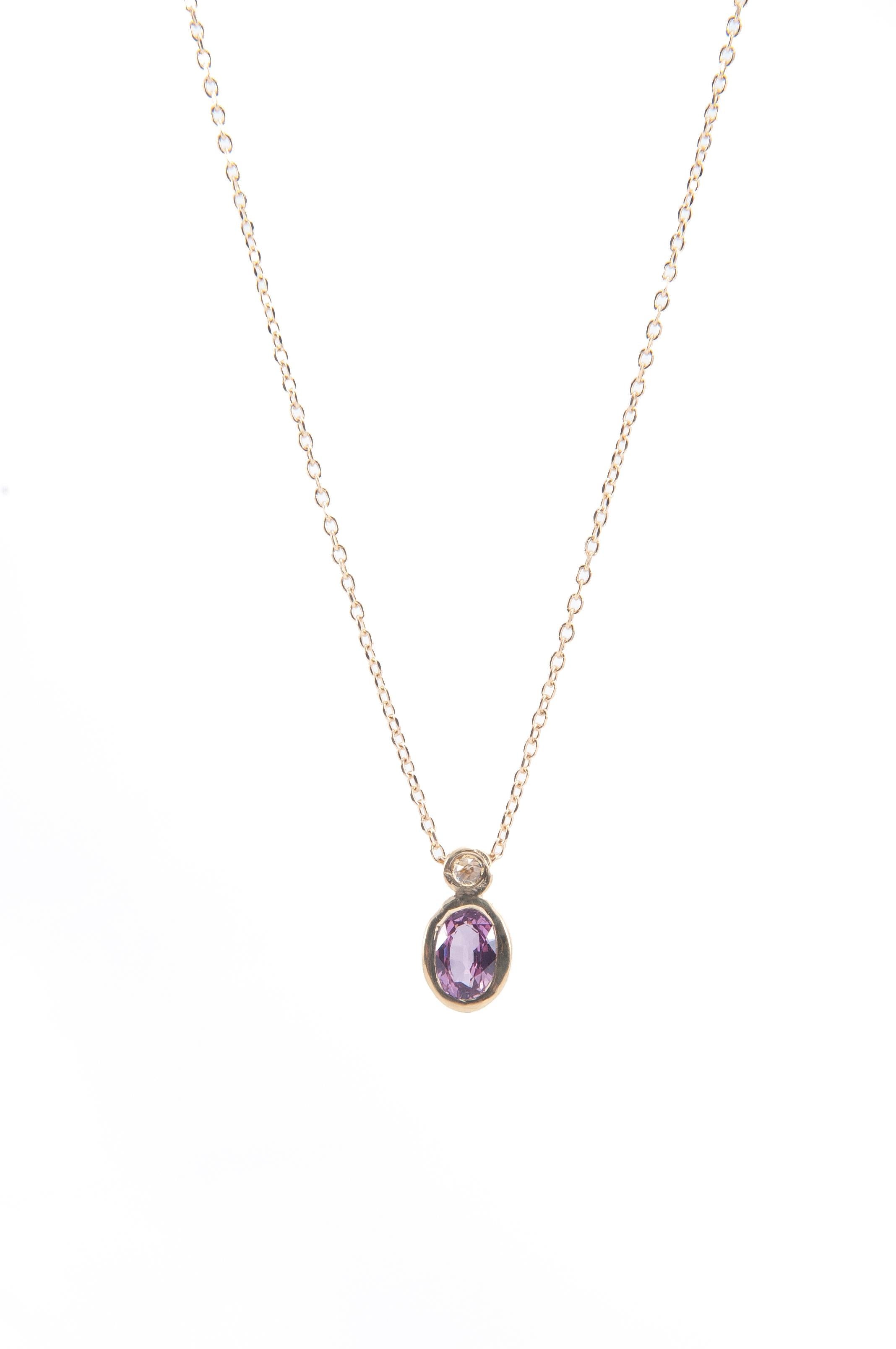 Playful colors combine to chic effect on this delicate pendant and chain.

18K yellow gold chain
bezel set 0.50ct rose cut pink sapphire
0.05ct rose cut cognac diamond drop pendant
18” chain