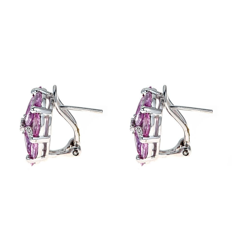 14 Karat White Gold 4.72 Ct Pink Sapphire and Diamond Stud Earrings Fine Jewelry

Simply perfect. These beautiful stud earrings are crafted in 14k white gold. Small marquise cut soft pink sapphires are fashioned in a flower design, accented by