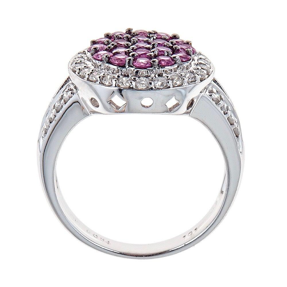  1.01 Carat Pink Sapphire and Diamond 18 Karat White Gold Round Ring Jewelry Fine

A perfect symbol of your affection. Perfect gift. This gemstone ring showcases a cluster of soft pink sapphires centered in a prong setting, accented by a frame of