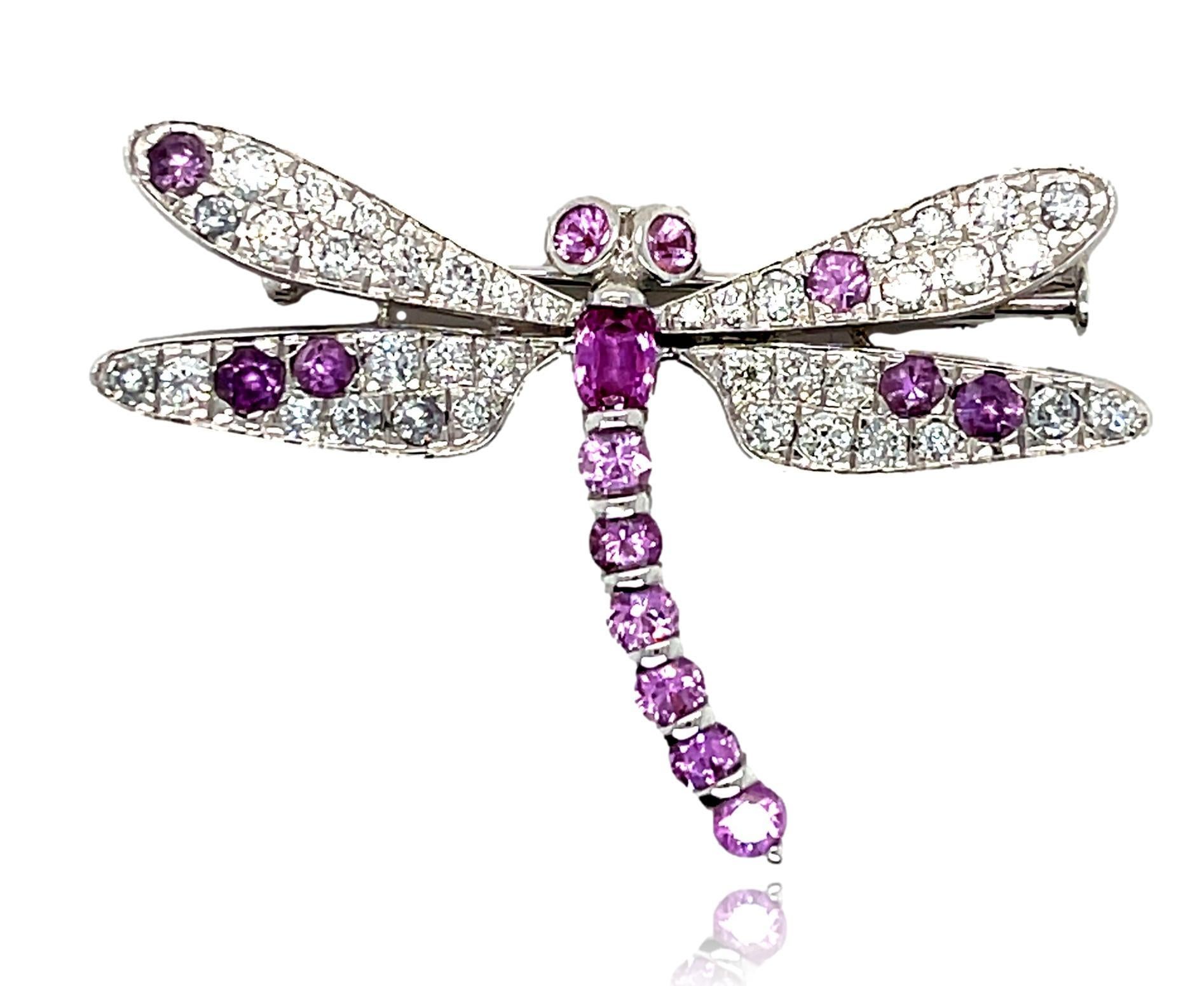 This stunning Butterfly Brooch is the perfect accent to wear at that cocktail event. It has 1 carats of sparkling diamonds and beautiful top quality Pink Sapphires all set in 18K white gold. It has a pull lock for extra security. This brooch comes