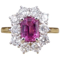 Pink Sapphire and Diamond Cluster Ring in 18 Carat Gold Pink Sapphire and Diamond Cluster Ring in 18 Carat Gold