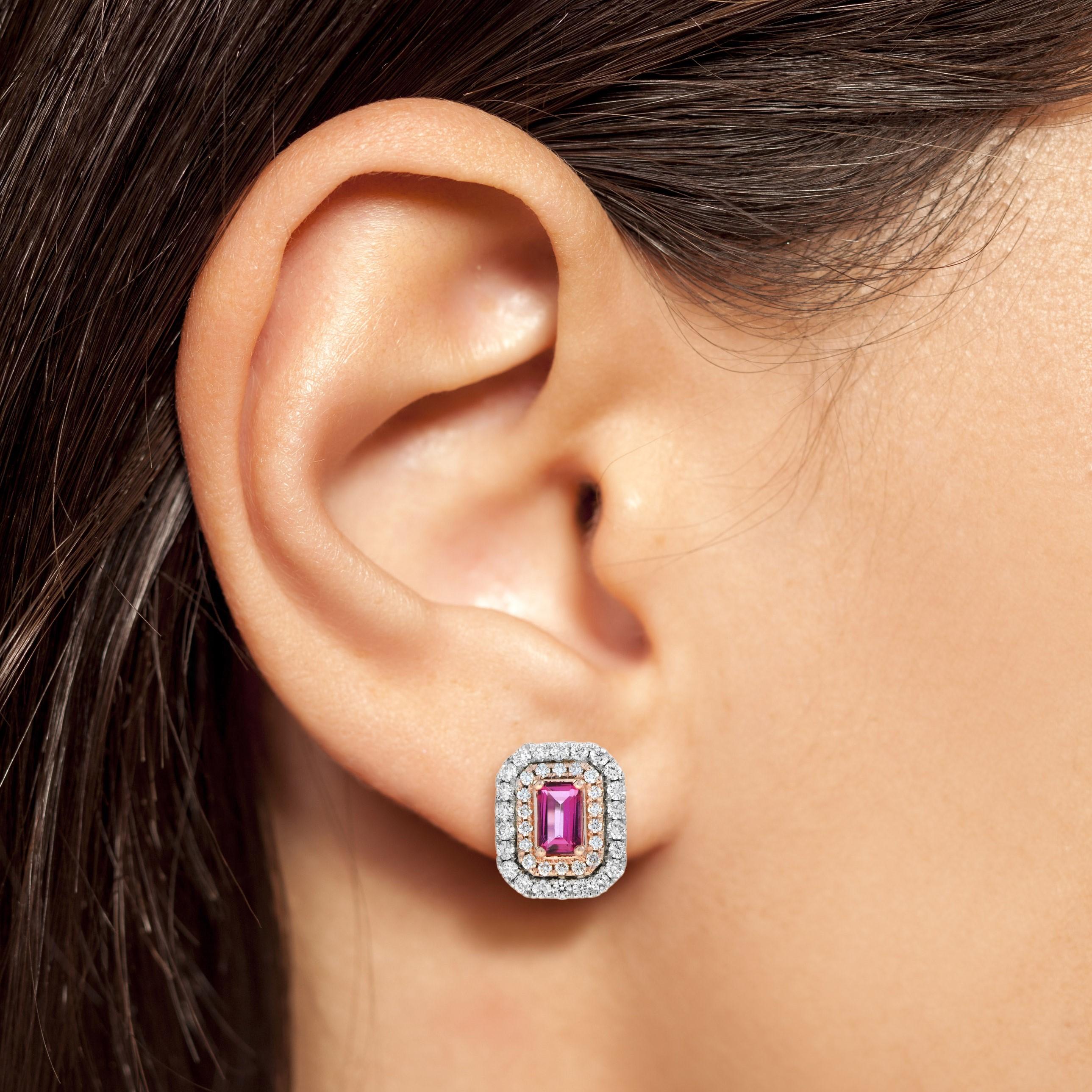 The two-tone version of standout double halo stud earrings are designed to hold 0.4 carat emerald cut pink sapphire for each center stone. The outer halo is in white gold while inner halo is rose gold. A truly spectacular stud earrings! Wear it with