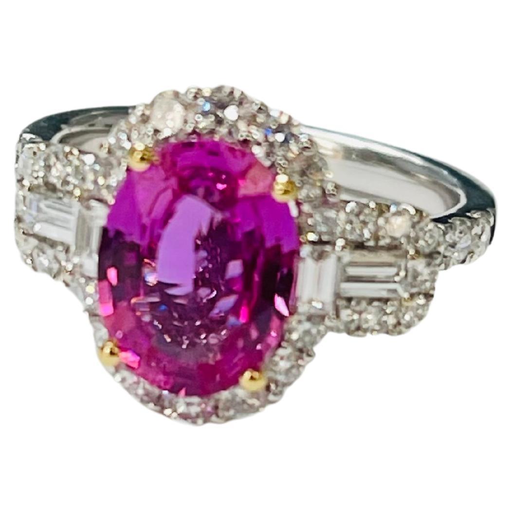Pink Sapphire and diamond engagement ring beautifully handcrafted in 18k white and yellow gold. 

The details are as follows : 

Total diamond weight : 1.04 carat ( G color and VS clarity ) 
Pink Sapphire weight : 2.16 carat
Metal : 18 karat 
Ring