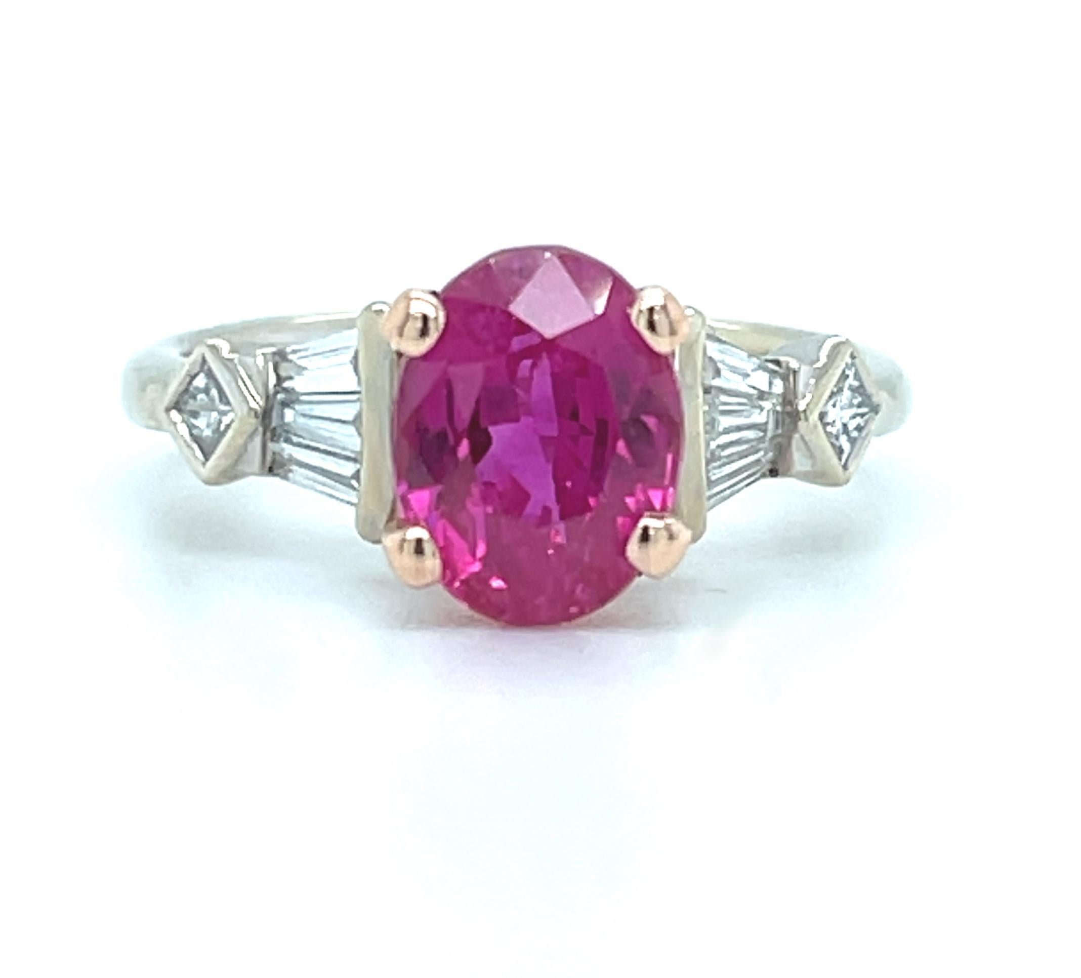 The intense color of the gorgeous pink sapphire in this ring can be described as 