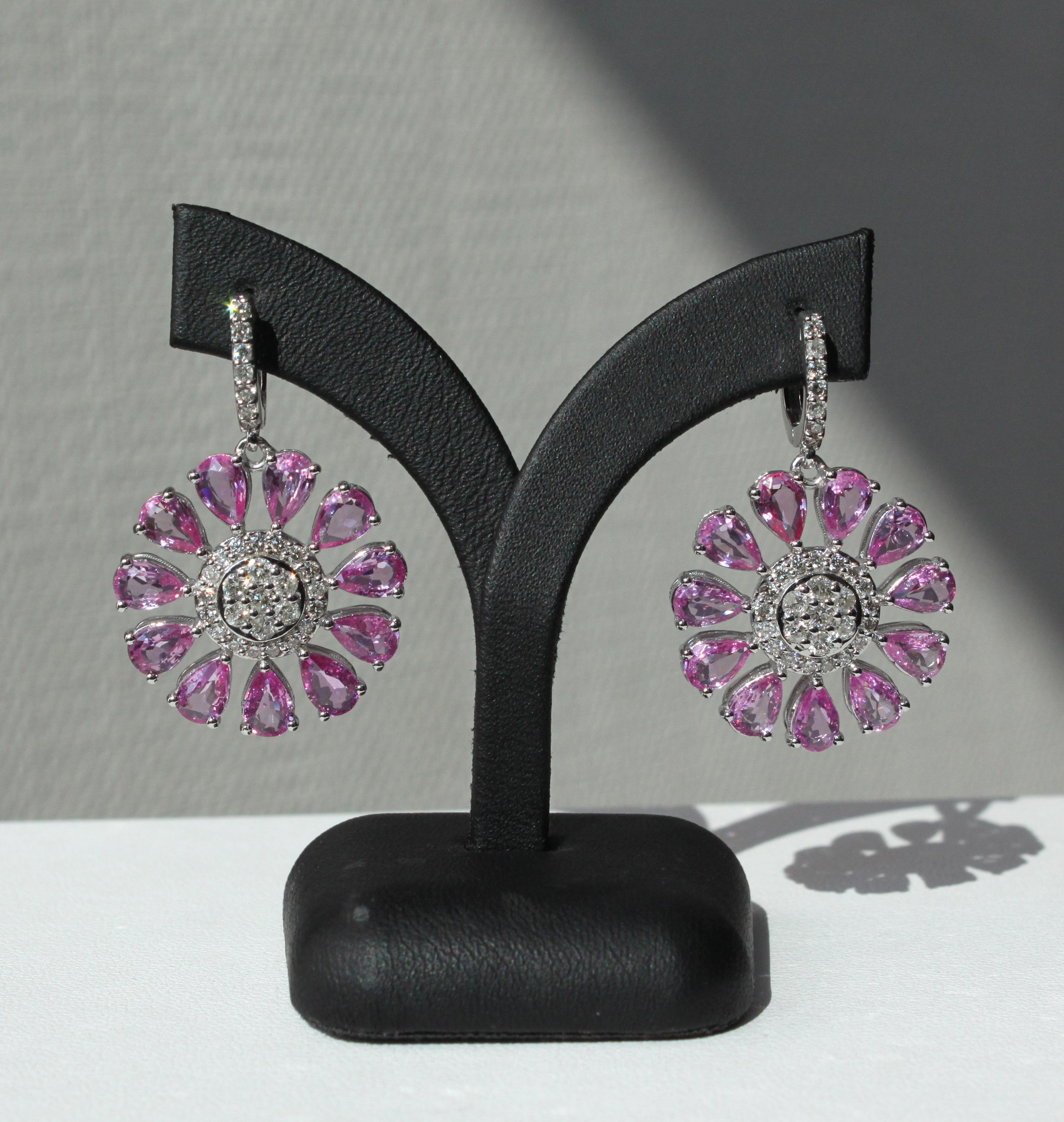 14K white gold
1.27ct natural diamonds VS-SI quality and Top Top light brown (TLB/ TTLB) colour
8.55ct natural pink sapphire VS-SI quality (light to medium colour)
Total earring weight 13.08g

Adorn your ears with sophistication and grace with our