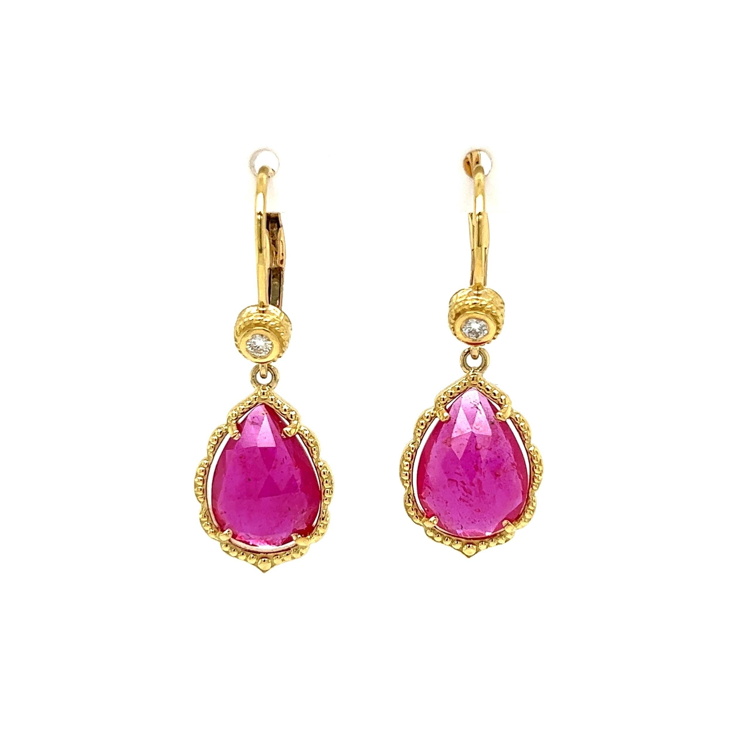 Simply Beautiful! Pink Sapphire and Diamond Gold Drop Earrings by Designer PENNY PREVILLE. Each earring centering a securely Hand set Pink Sapphire, approx.7.68tcw. of 2 Sapphires. Surrounded by Diamonds weighing approx. 0.08tcw. Hand crafted 18K