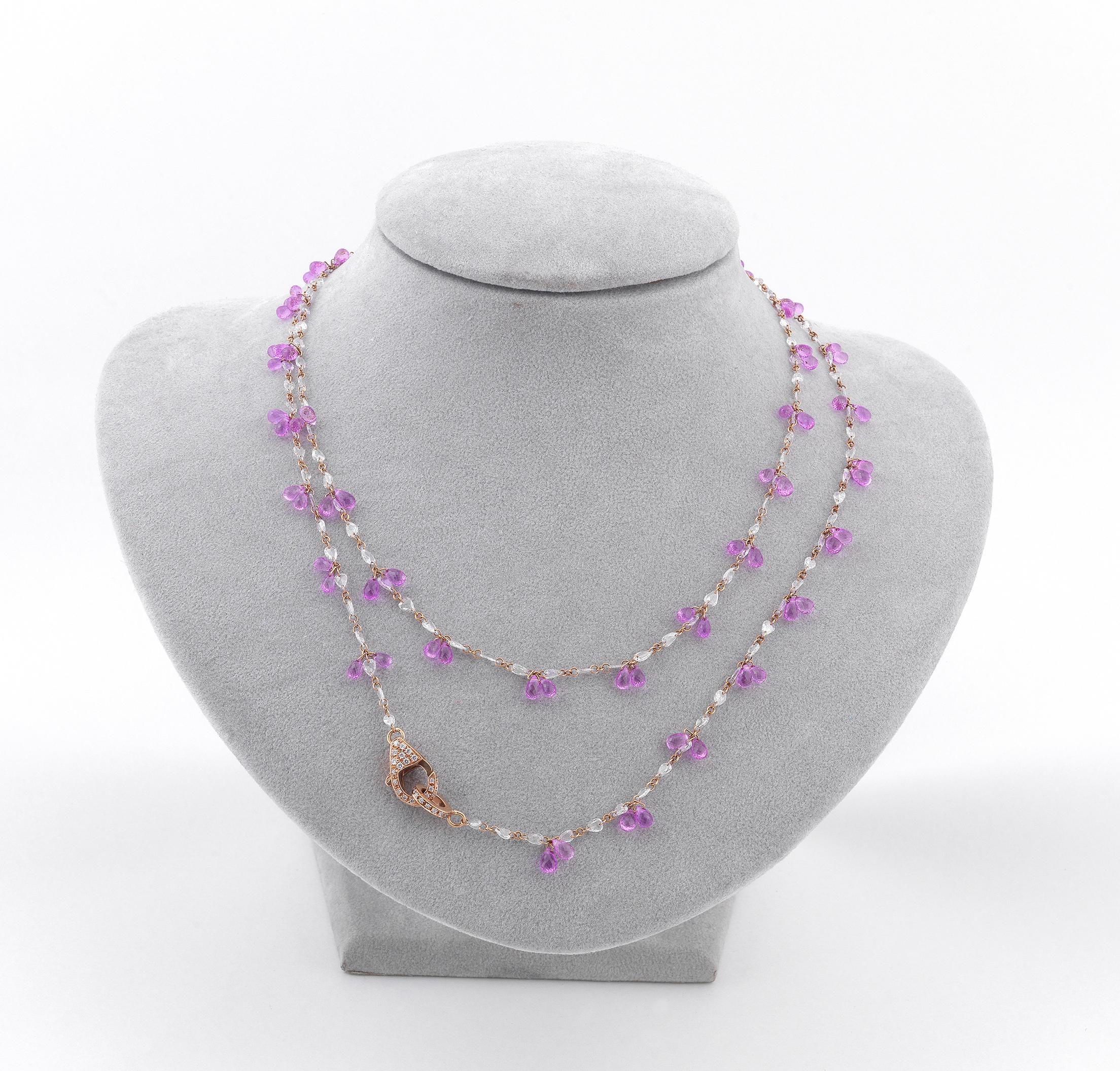 

The necklace composed of oval-shaped briolette-cut pink sapphires, each interspersed by round-shaped briolette-cut diamonds, mounted in 18K gold, sapphires weighing approximately 15.00cts total, diamonds approximately weighing 4.5cts total, length