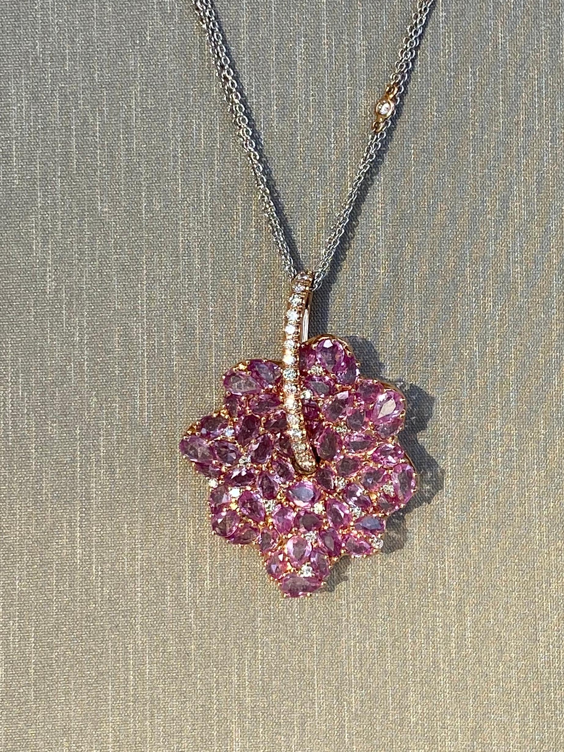 Pink Sapphire And Diamond Pendant Necklace.   This one of a kind chain necklace has 7.96 carats of Freeform Single Cut Sapphires and  .49 carats of Brilliant round cut Diamonds, F-G color and VS clarity, all set into 18 karat rose gold.  Free-form