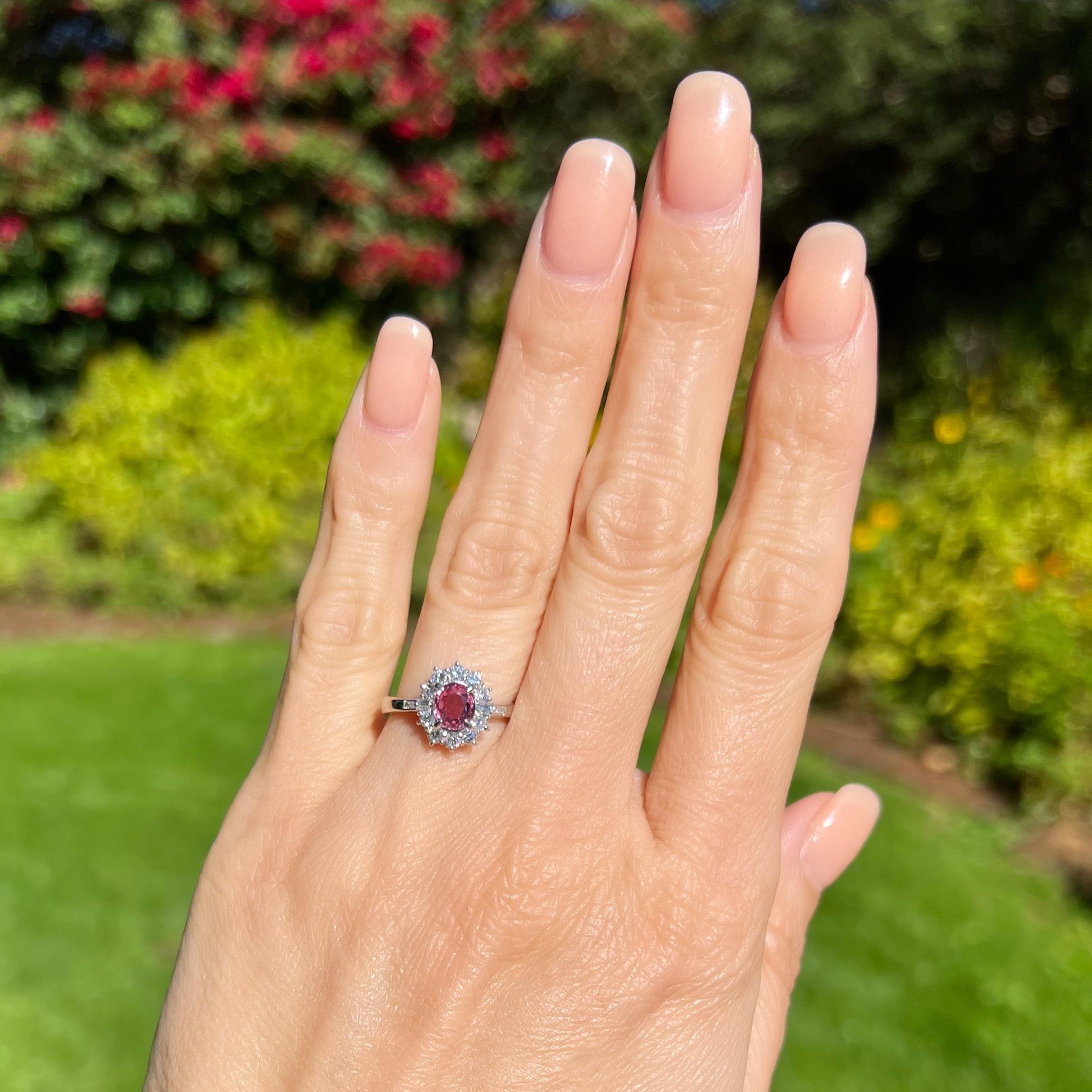 Modern Pink Sapphire and Diamond Platinum Halo Ring For Sale