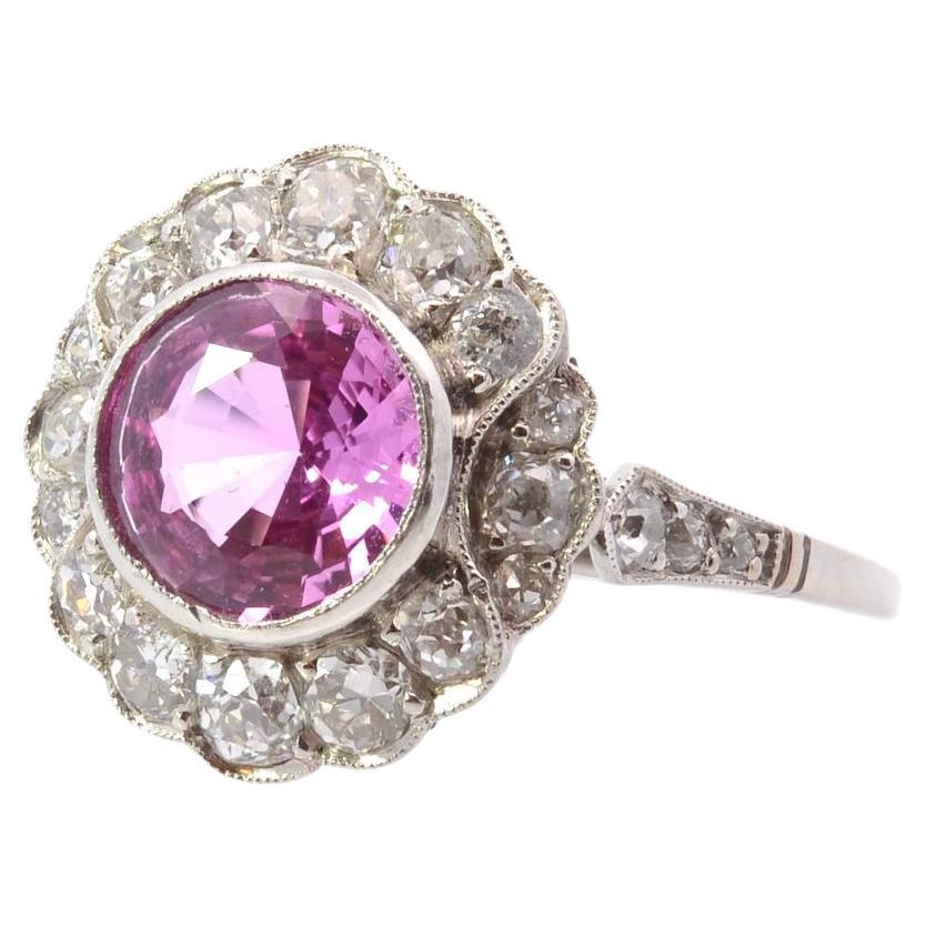 Pink sapphire and diamond ring in platinum For Sale