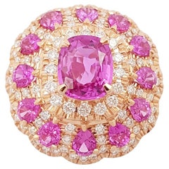Bague en or rose 18 carats sertie de saphir rose et de diamants