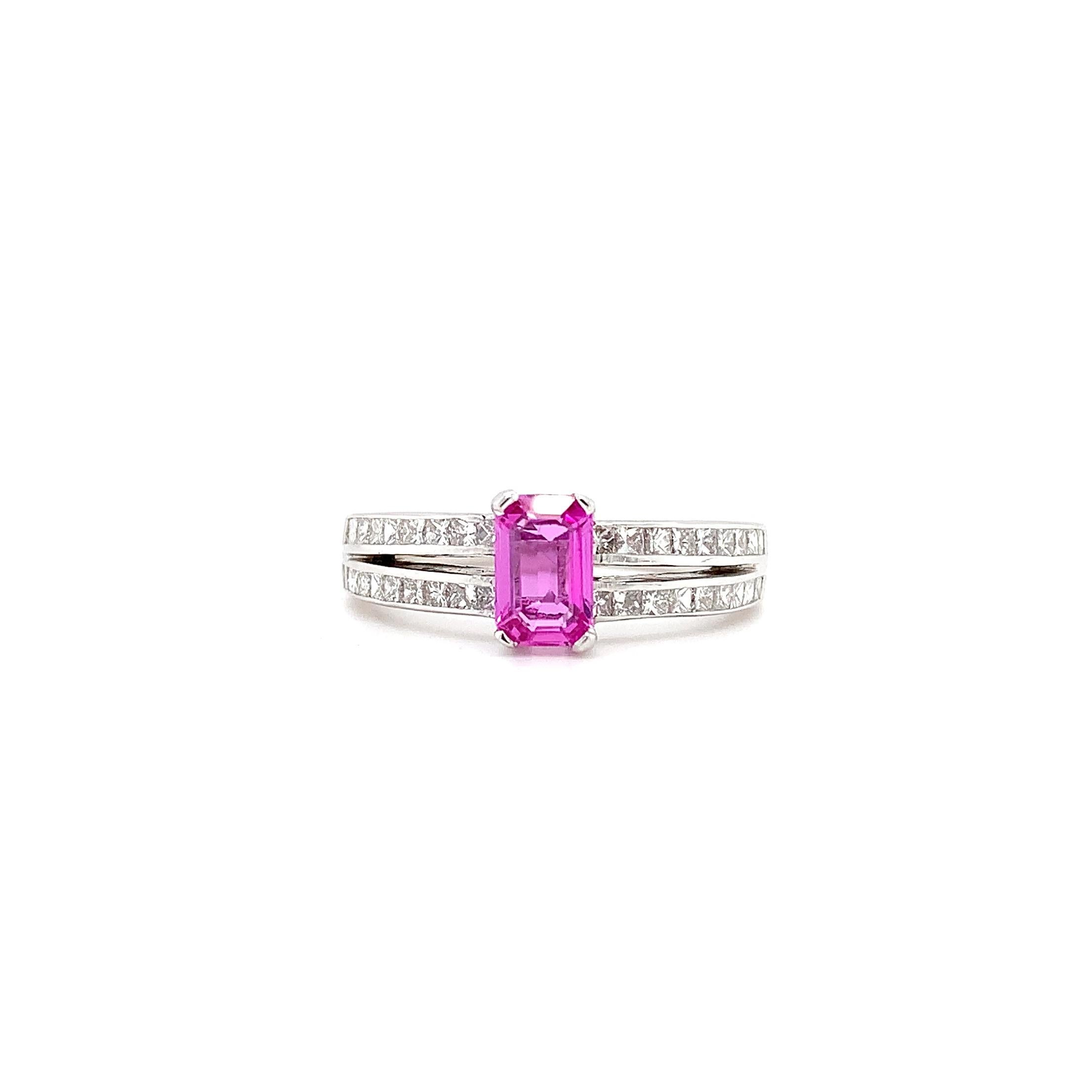 Pink sapphire and diamond solitaire engagement ring 18ct white gold
1.50ct Pink sapphire and diamond double band engagement ring in 18ct white gold.
Pink sapphire emerald cut natural gemstone total weight 0.70ct 
Round diamond cut total weight