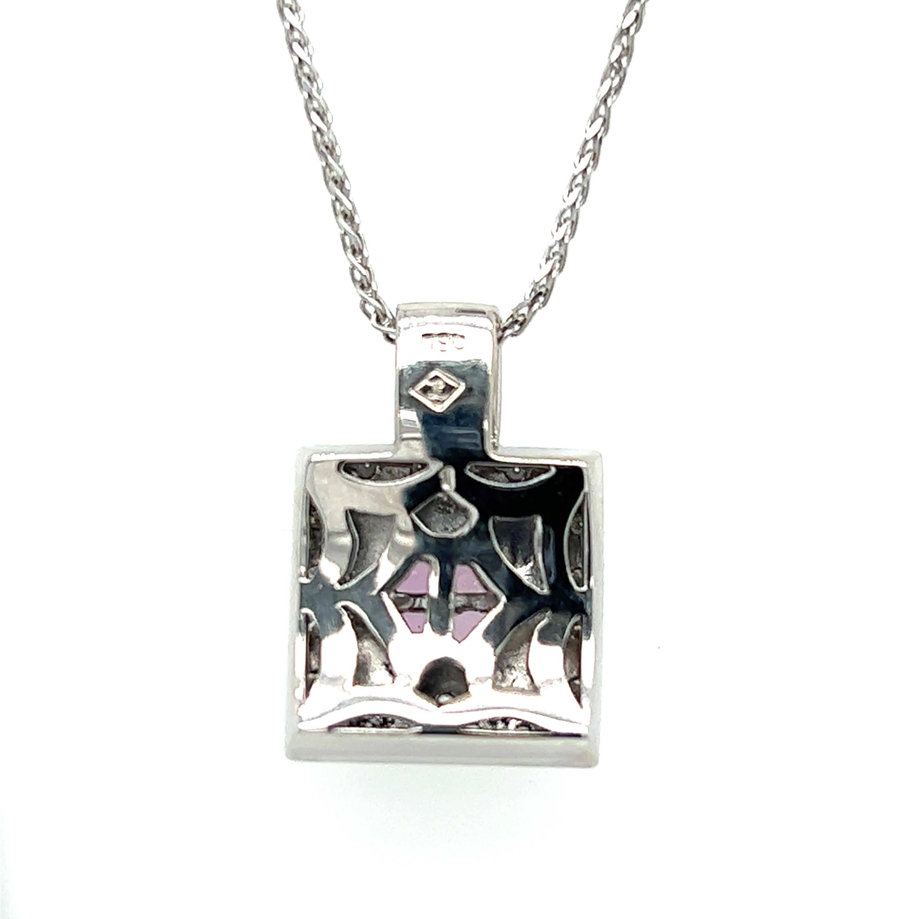 One 18-karat white gold square design pendant, set with four (4) 2.75mm square cut pink sapphires, and forty-eight (48) brilliant cut diamonds, approximately 1.00-carat total weight with matching H/I color and SI1 clarity.  The pendant is suspended