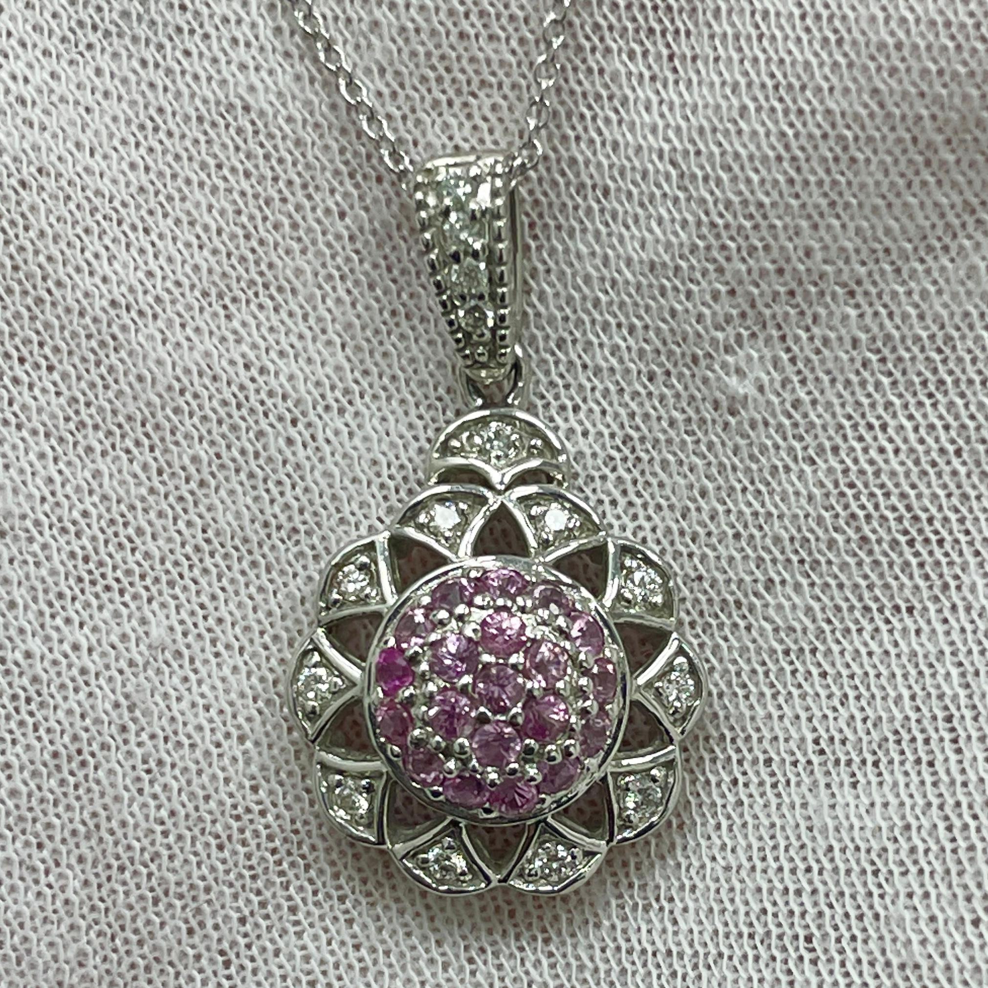 .70Ct round pink sapphires in a diamond (.17Ct) 14K white gold pendant