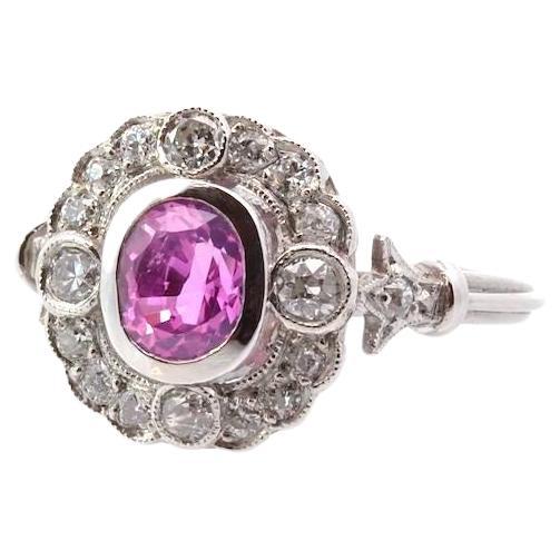 Pink sapphire and diamonds ring in platinum