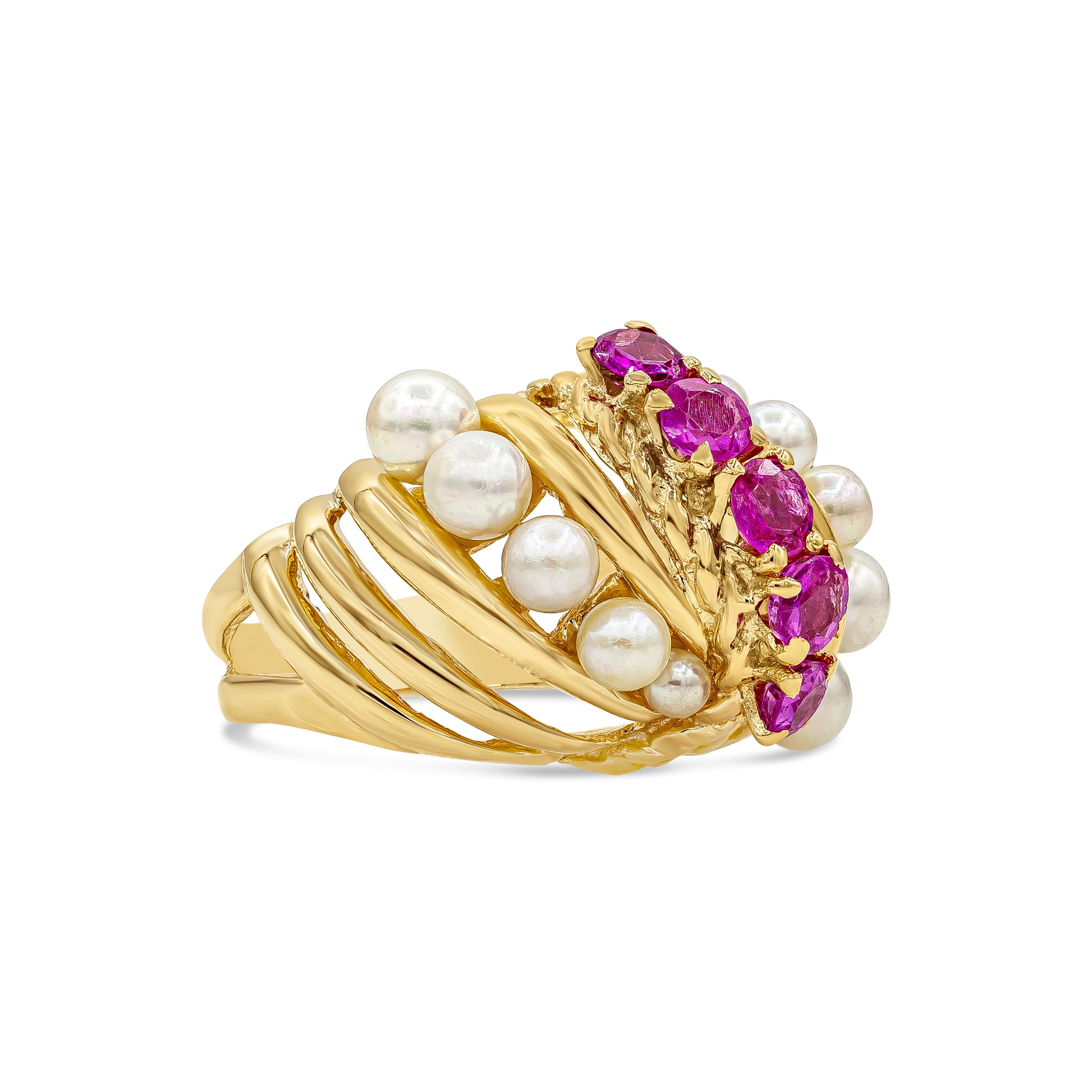 A fashionable cocktail ring featuring a row of round cut pink sapphires, accented on each side with a row of round pearls. Made in 14k yellow gold. Sapphires weigh approximately 1.01 carats total. Size 6 US resizable upon request.

Style available