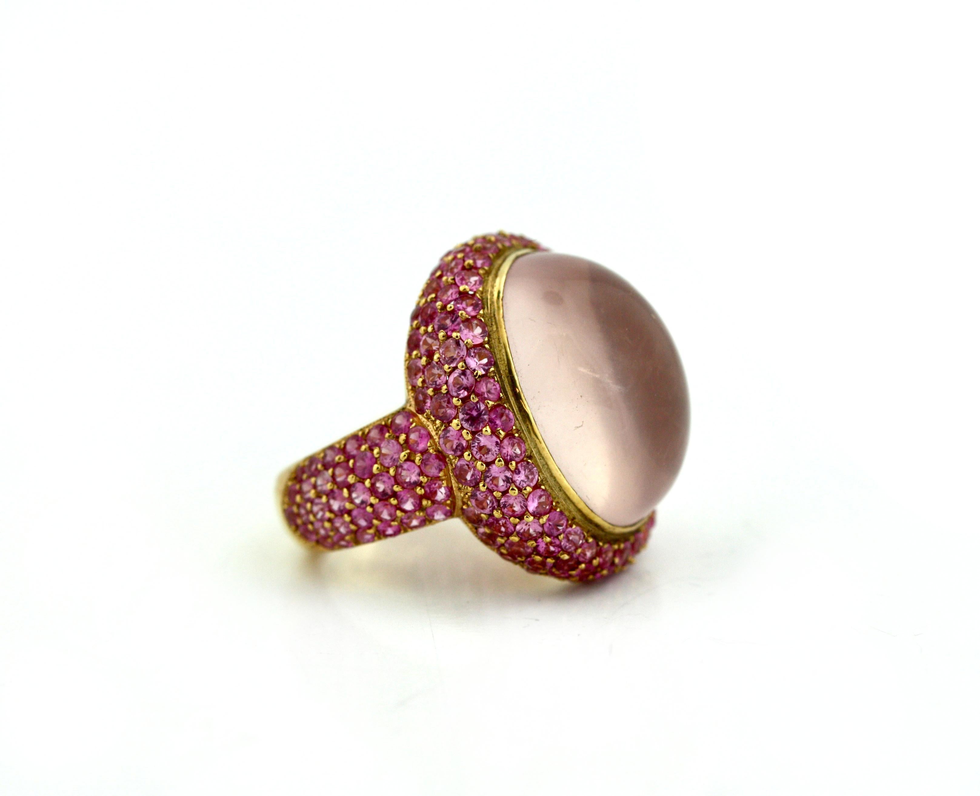 18KT GOLD, PINK SAPPHIRE AND ROSE QUARTZ RING
Rose Quarts approx. 21.28 carats, Pink Sapphires approx. 5.32 carats
size 6