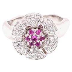 Verlobungsring „Flower“ aus Gold mit rosa Saphir und weißem Diamant