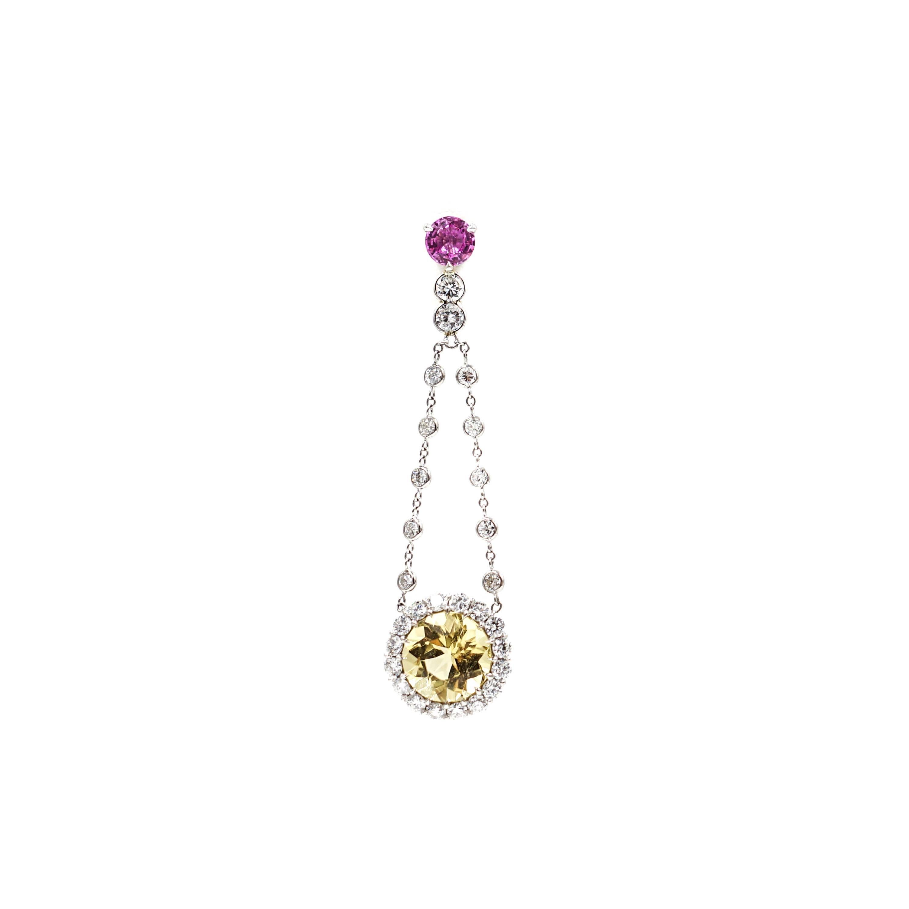 Graceful and feminine... This gorgeous pair of earrings is designed with Diamonds, Pink Sapphires and Yellow Beryl, combinined to create a contrast of colors with a delicate look that can express your personality and taste.
Measures 2 inches in