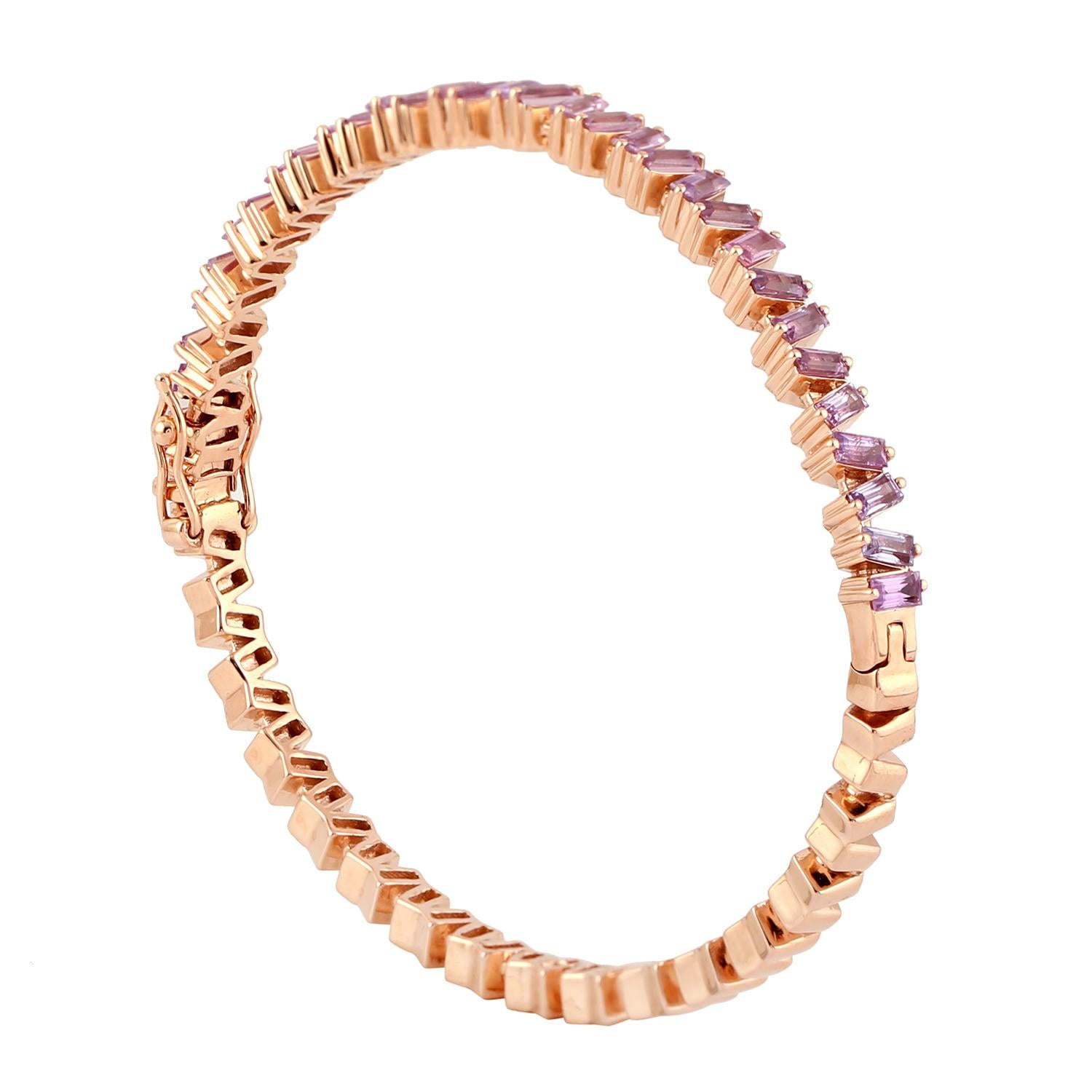 Women's Oval Shaped Pink Sapphire Baguette Bangle Made In Rose Gold For Sale