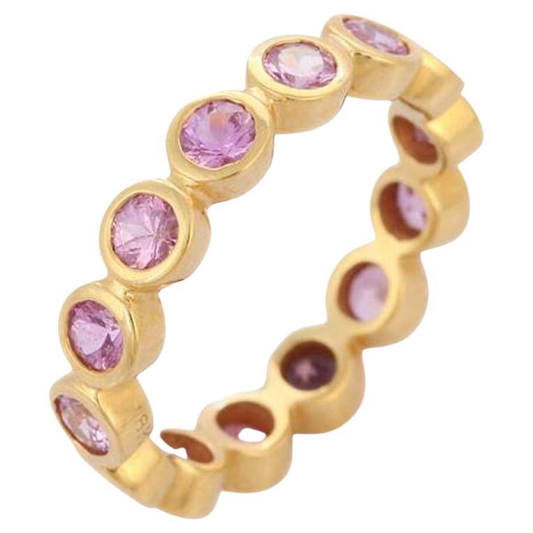 Bague à anneau en or jaune 18 carats et saphir rose