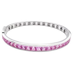Pink Sapphire Bangle set in 18K White Gold Settings