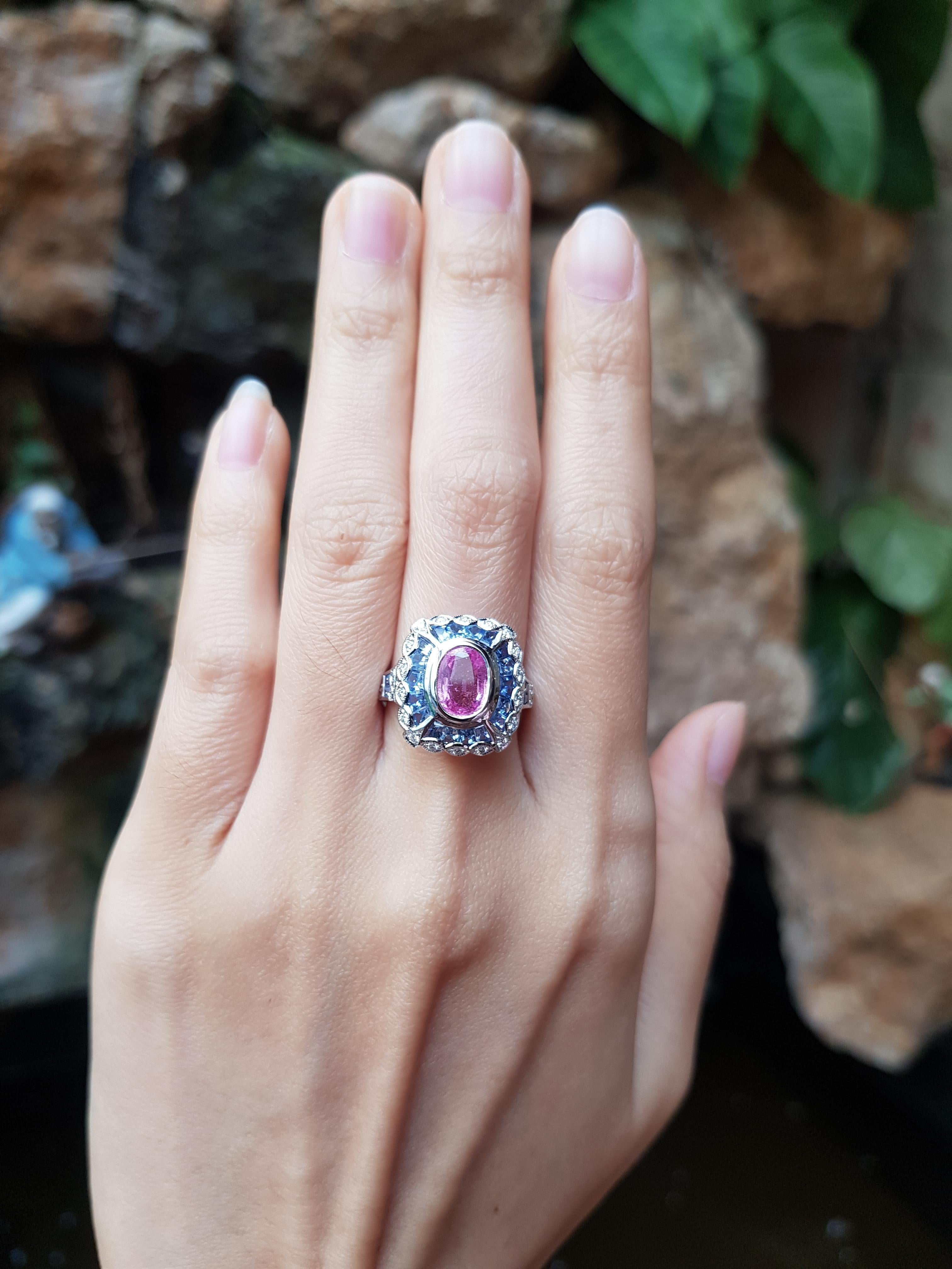 Pink Sapphire 1.60 carats, Blue Sapphire 2.76 carats and Diamond 0.20 carat Ring set in 18 Karat White Gold Settings

Width:  1.6 cm 
Length: 1.7 cm
Ring Size: 53
Total Weight: 7.14 grams

