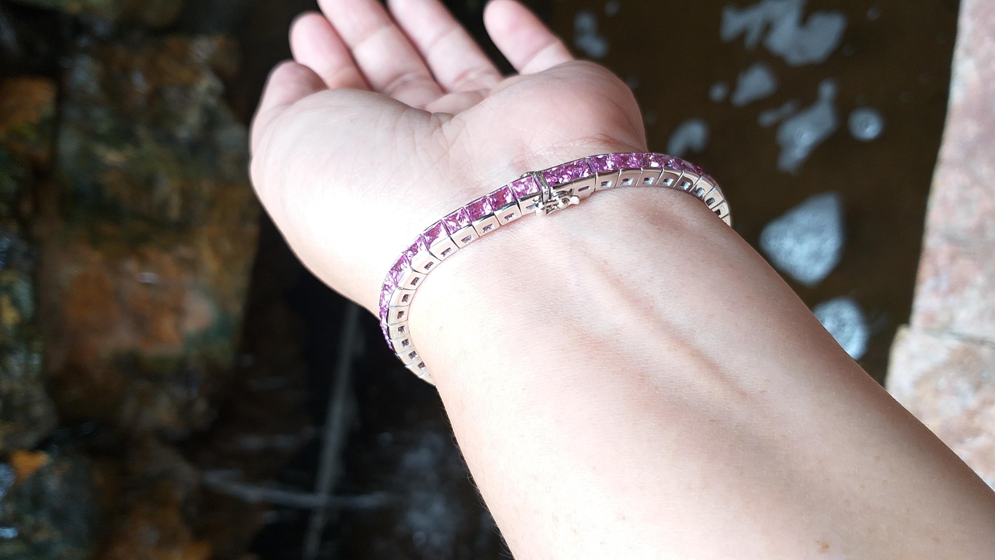 Pink Sapphire 16.44 carats Bracelet set in 18 Karat White Gold Settings

Width:  0.5 cm 
Length: 18.0 cm
Total Weight: 30.12 grams

