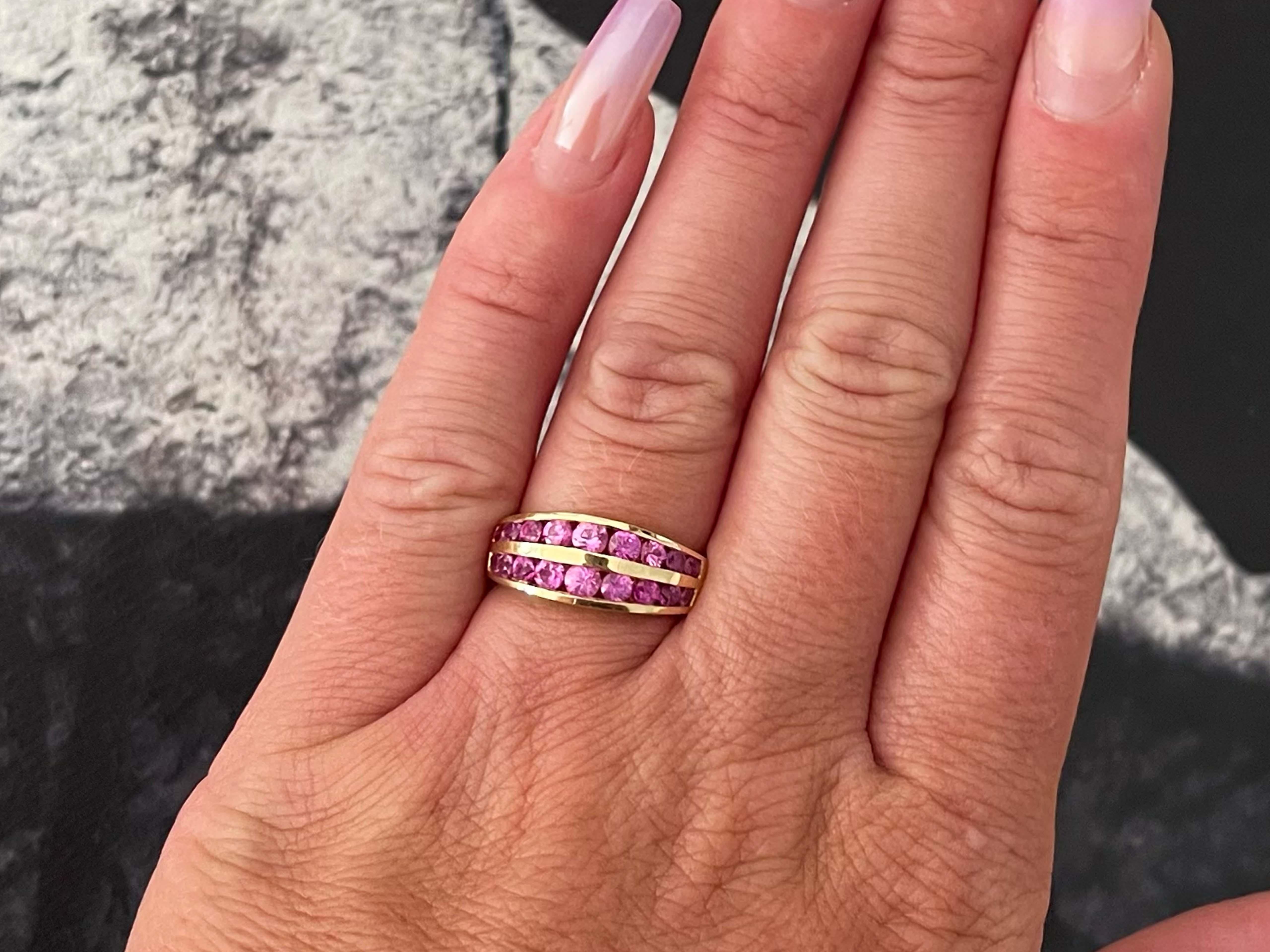 Item Specifications:

Metal: 14K Yellow Gold

Ring Size: 6.5

Total Weight: 3.9 Grams

Gemstone Specifications:

Gemstones: 18 pink sapphires

Condition: Preowned, Excellent

Stamped: 