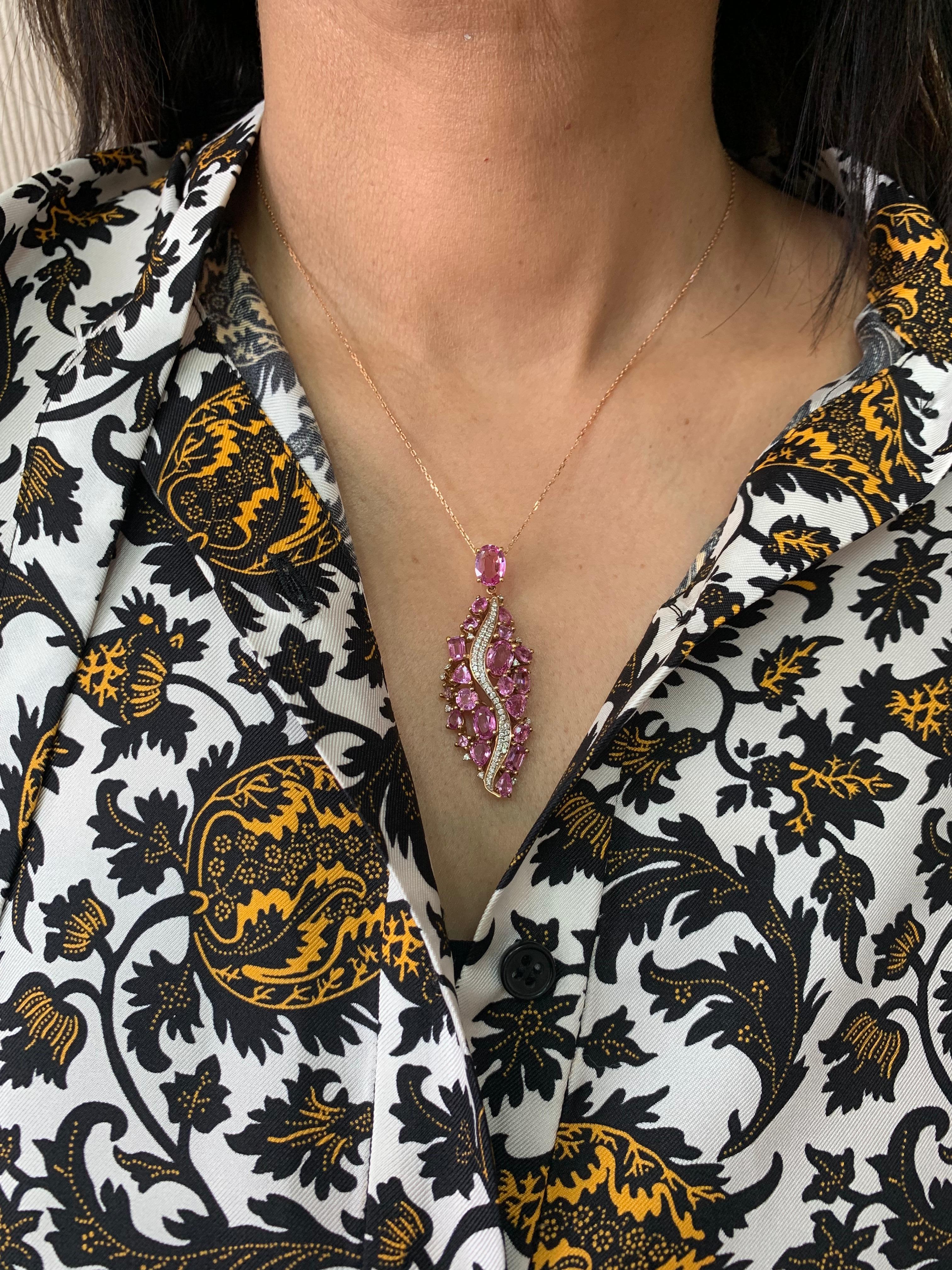 Sunita Nahata presents an exclusive collection of pink sapphire pendants. With a mix of floral designs and cluster setting these pieces are accented with diamonds to present a unique array of pendants.

Designer pink sapphire pendant necklace in 18K