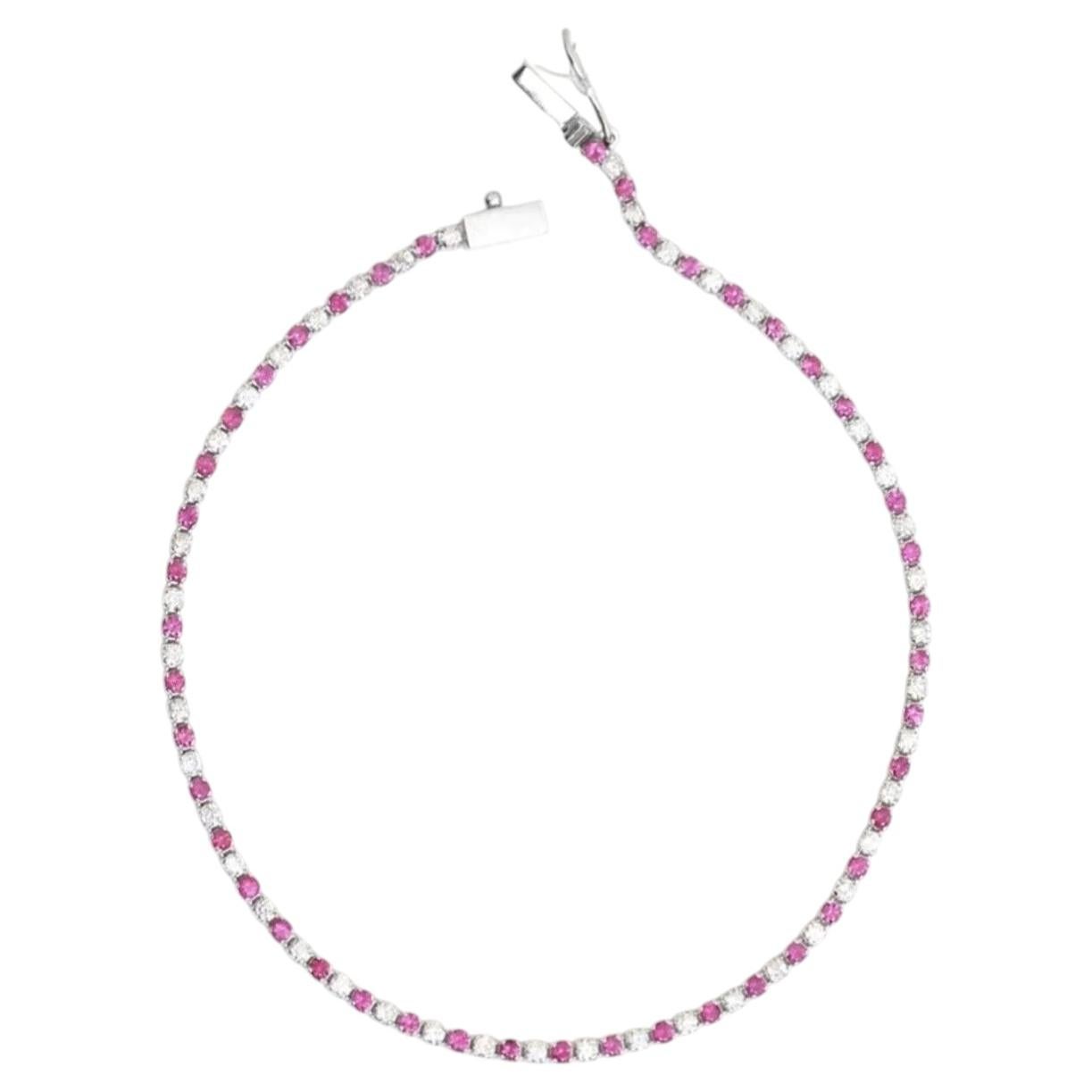 Tennisarmband aus 14-karätigem Gelbgold mit 0,79 Karat rosa Saphir und Diamanten