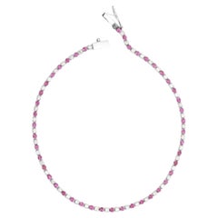 Tennisarmband aus 14-karätigem Gelbgold mit 0,79 Karat rosa Saphir und Diamanten