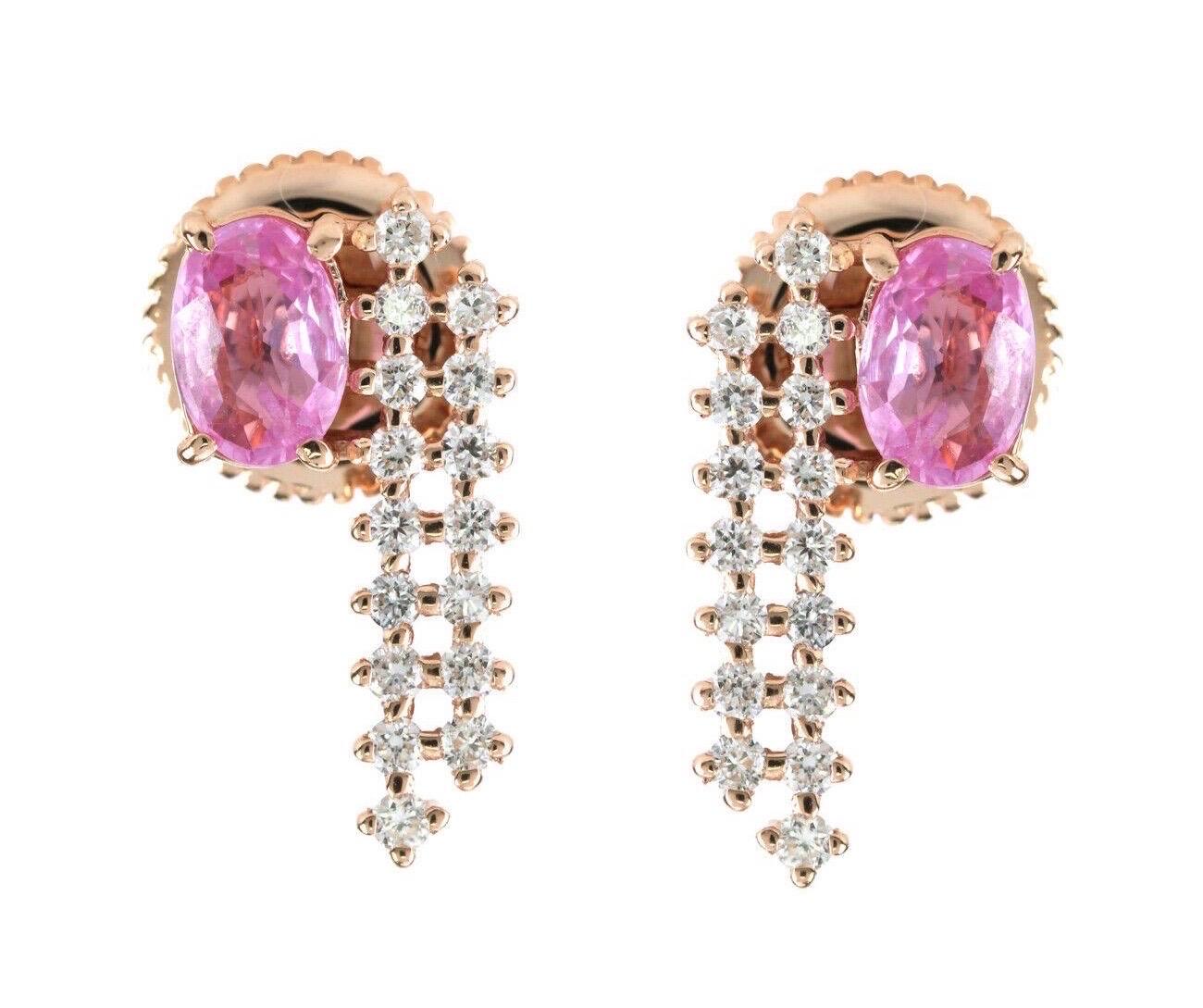 Cast from 18-karat gold, these beautiful earrings are hand set with .96 carats pink sapphire and .36 carats of sparkling diamonds. 

FOLLOW MEGHNA JEWELS storefront to view the latest collection & exclusive pieces. Meghna Jewels is proudly rated as