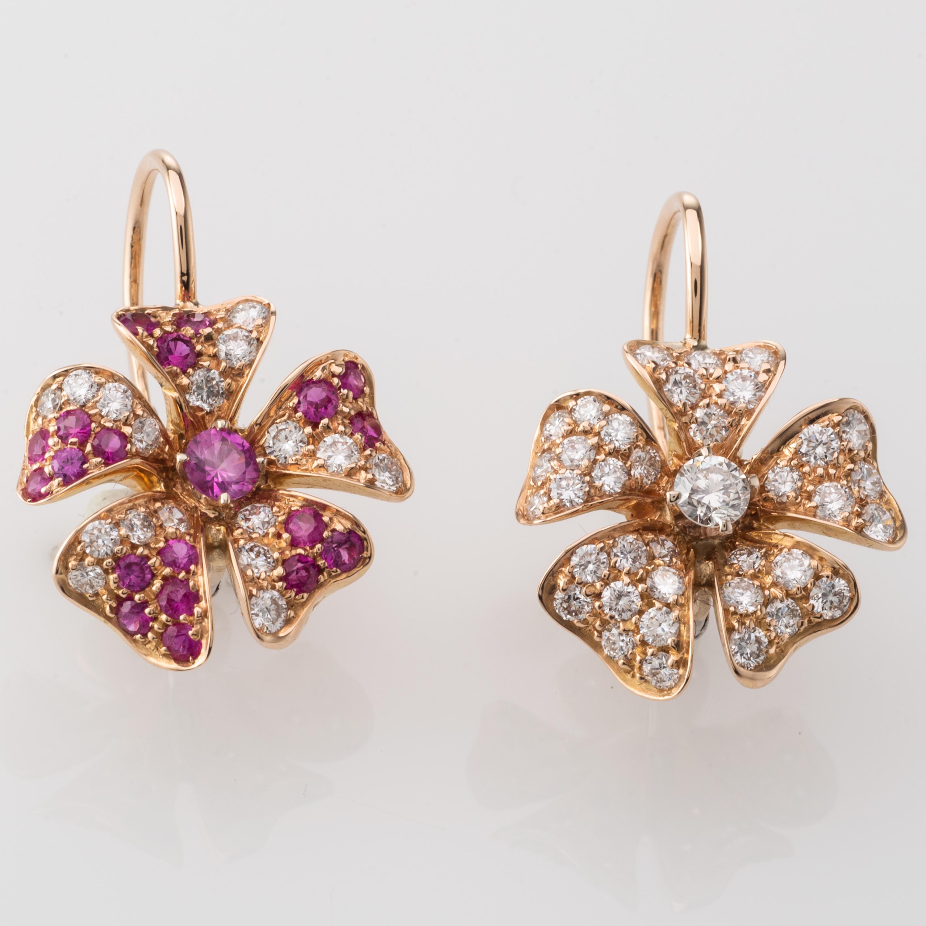 Fashion style Earrings set with Pink Sapphire and Diamonds.
0.89 Carat Diamond and 1.01 Carat of Pink Sapphire set in 18 Karat Rose Gold.
Customisation of gold colour, stones is possible. We can custom make this item according to your taste. When
