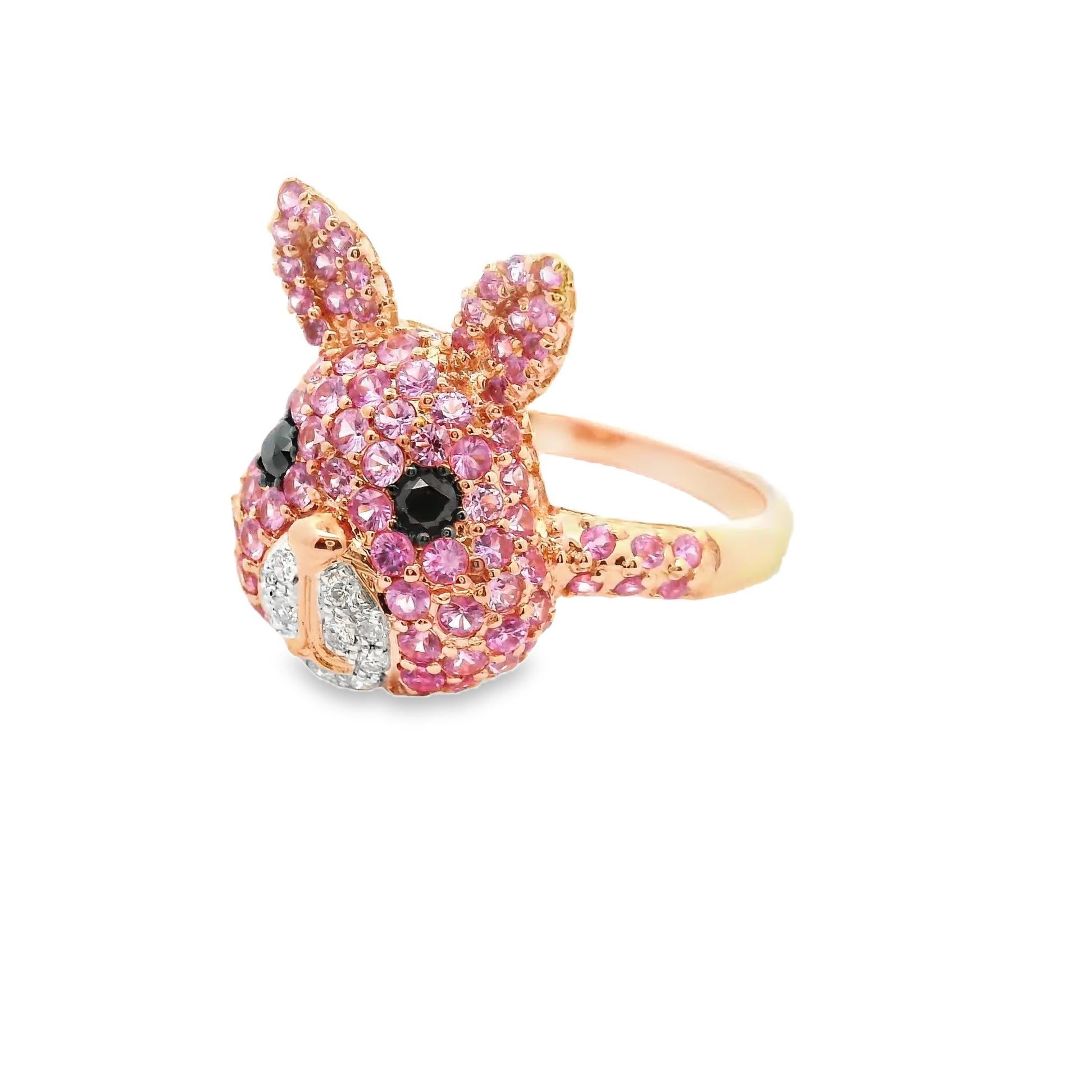 A cute and stylish ring featuring a sweet bunny rabbit! The bunny is studded with 1.80 carats of round pink sapphires along with 0.30 carats of diamonds which make up the bunny’s eyes and mouth. Made in 18k rose gold, this cute and cuddly critter is