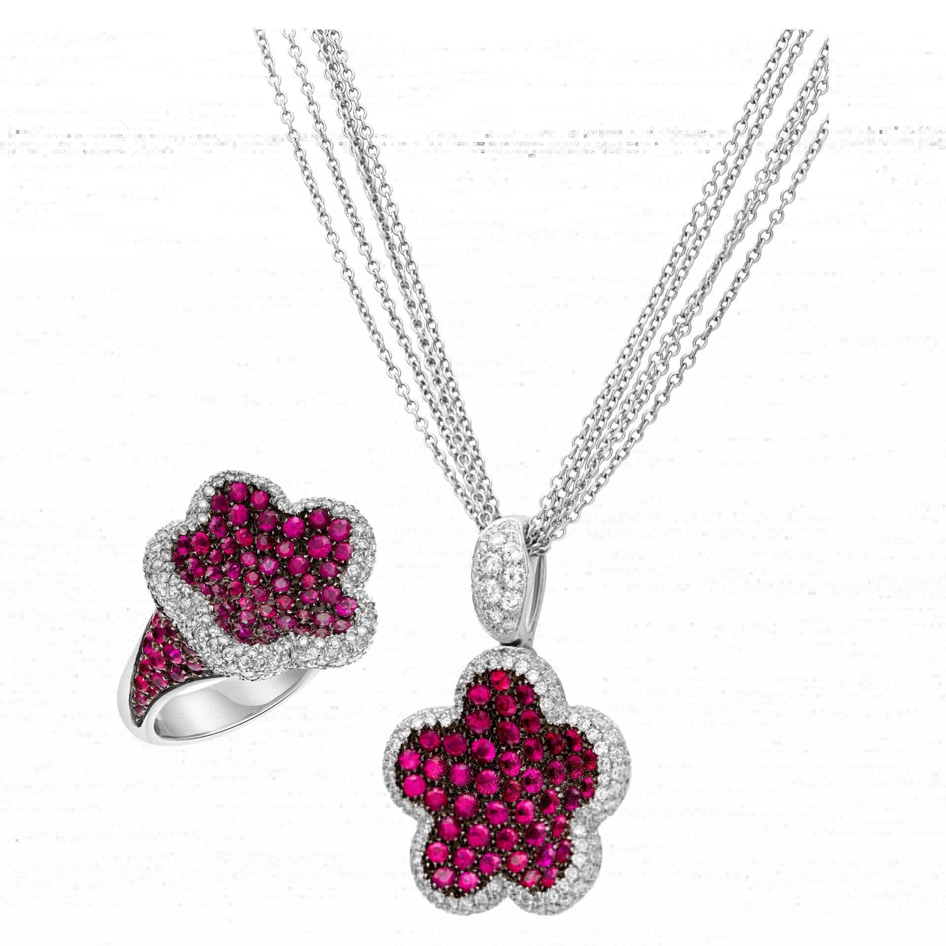 Pink sapphire & diamond 2 piece pendant/necklace & ring set in 18k white gold. Ring: round brilliant cut diamond total approx weight: 1.35 carat & pink sapphire total approx. weight: 3.90 carat. Enhancer/pendant round brilliant diamond total approx.