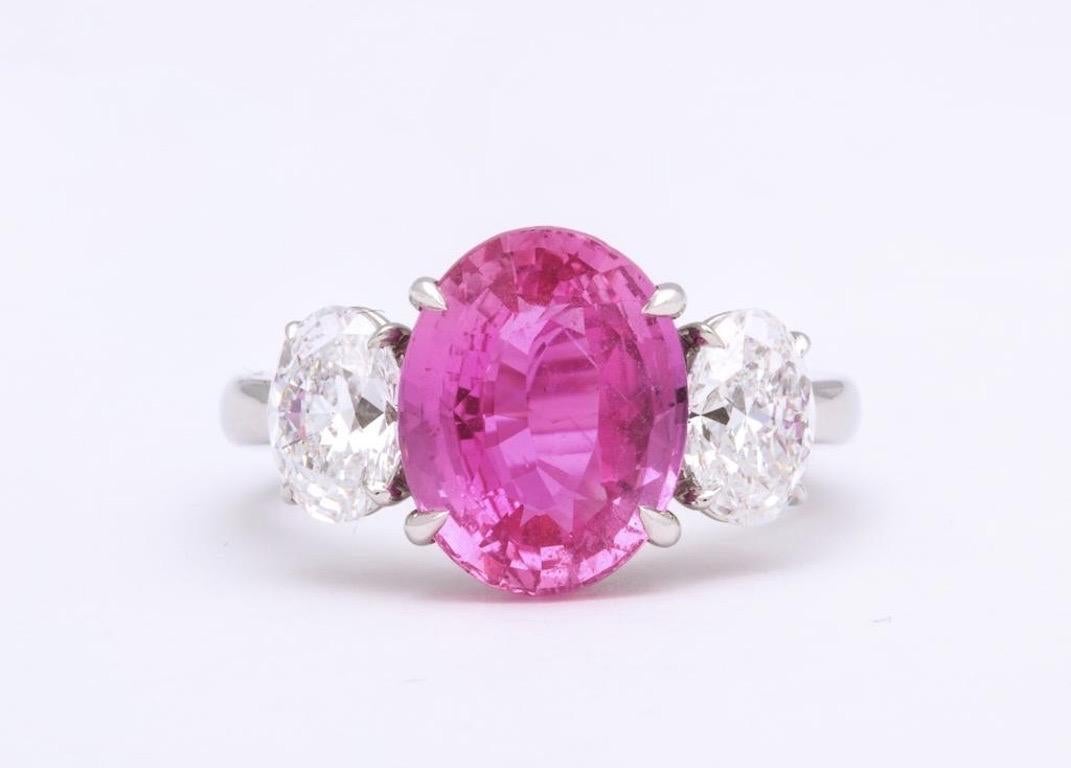 Three perfect ovals, expertly mounted in platinum, make up this classic ring.
Vivid pink sapphire: 5.57cts
Oval diamond GIA certified D color VS1 clarity: 1.00cts
Oval diamond GIA certified E color VS1 clarity: 1.00cts
Handmade in New York