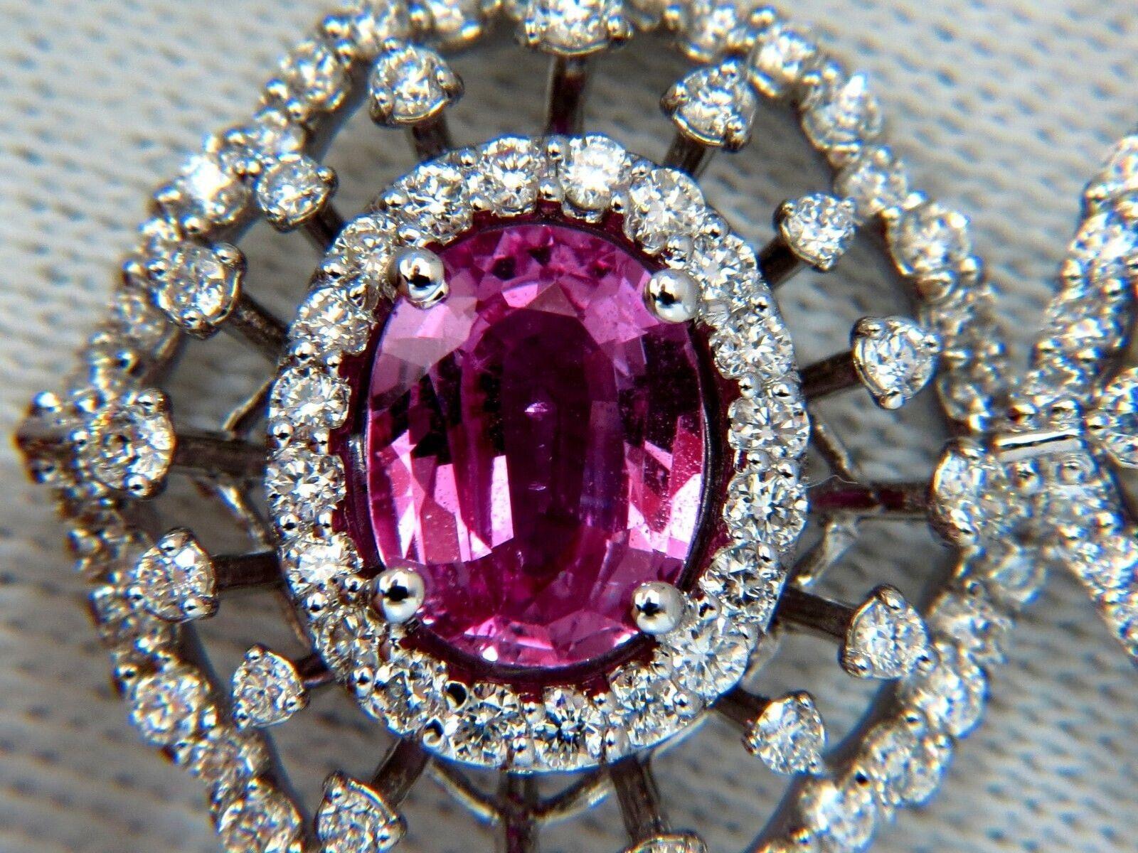 GIA certified Natural purple pink Sapphire earrings.


4.16ct. Natural Pink Sapphires


Full Brilliant Oval Cuts.


8.9 X 6.7mm


Report # 6224843349


 


Diamonds: 


Rounds, full cuts


2.26ct.


G-color, Vs-2 clarity


10.9 grams


14Kt. white