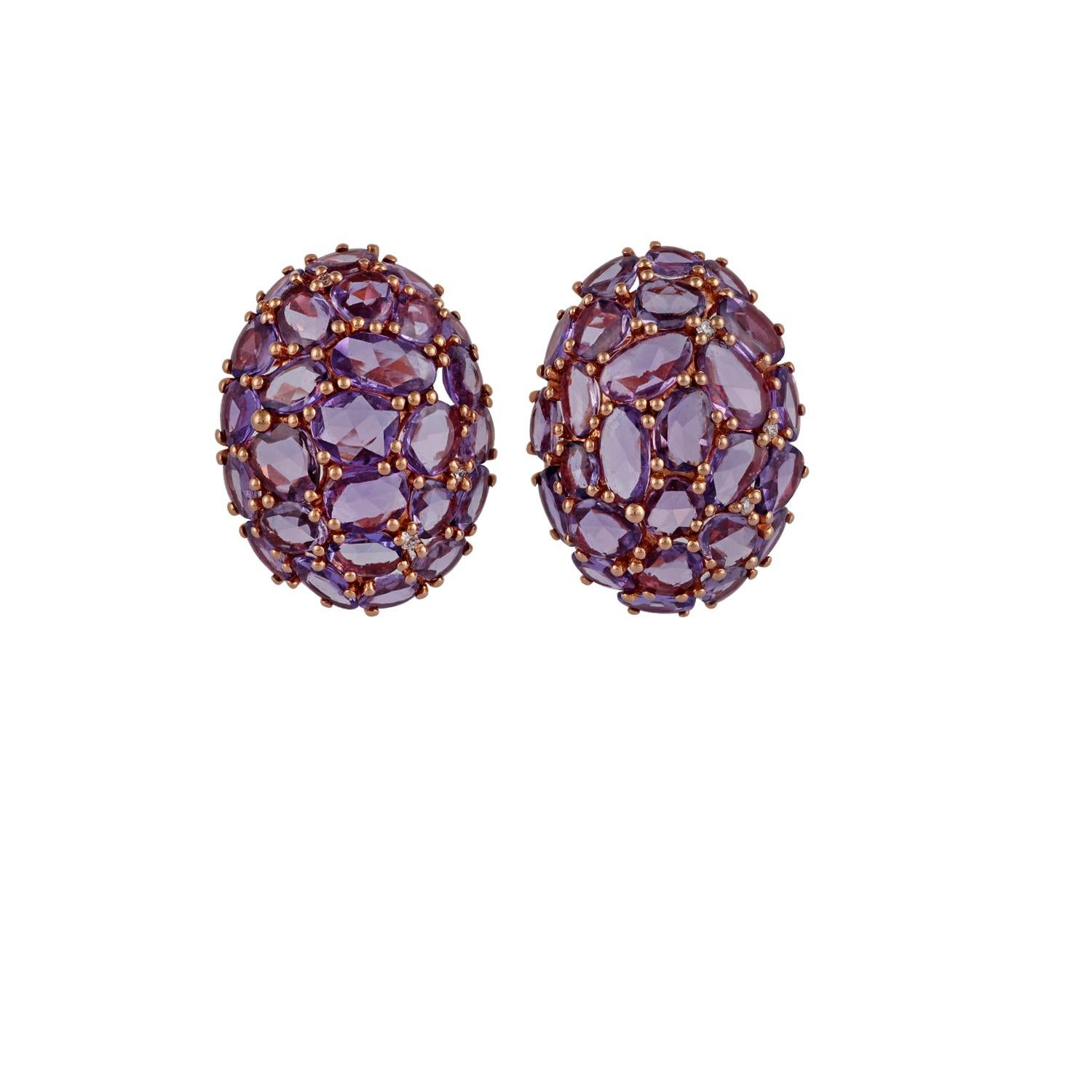 These are exclusive pink sapphire & diamond earrings studded in 18k rose gold features 52 pieces of rose cut pink sapphires weight 16.32 carats with 6 pieces of round shaped diamonds weight 0.06 carats, these entire earrings made of 18k rose gold
