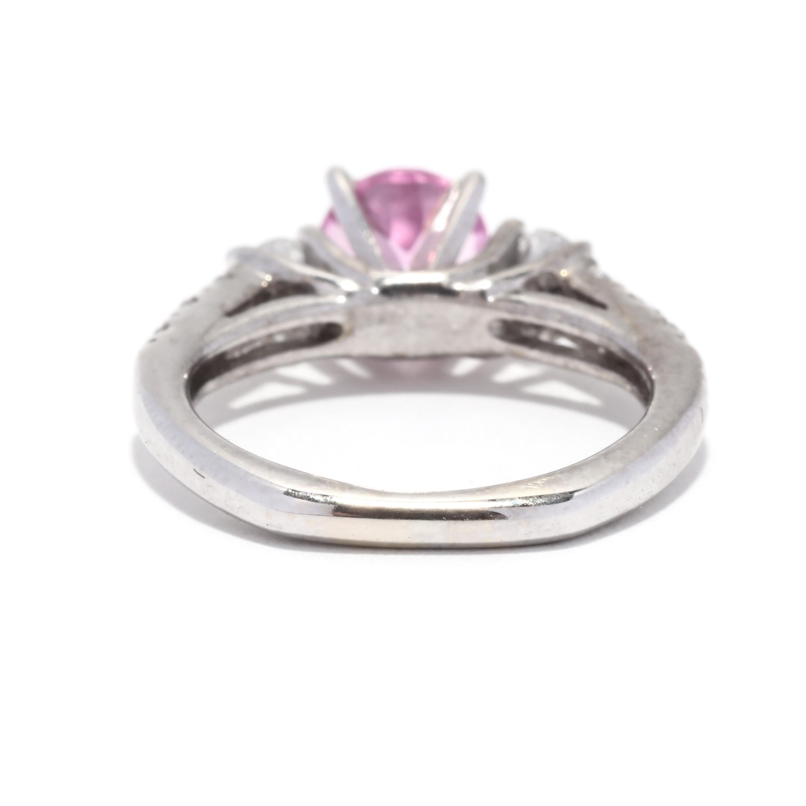 diamond ring with pink sapphire side stones