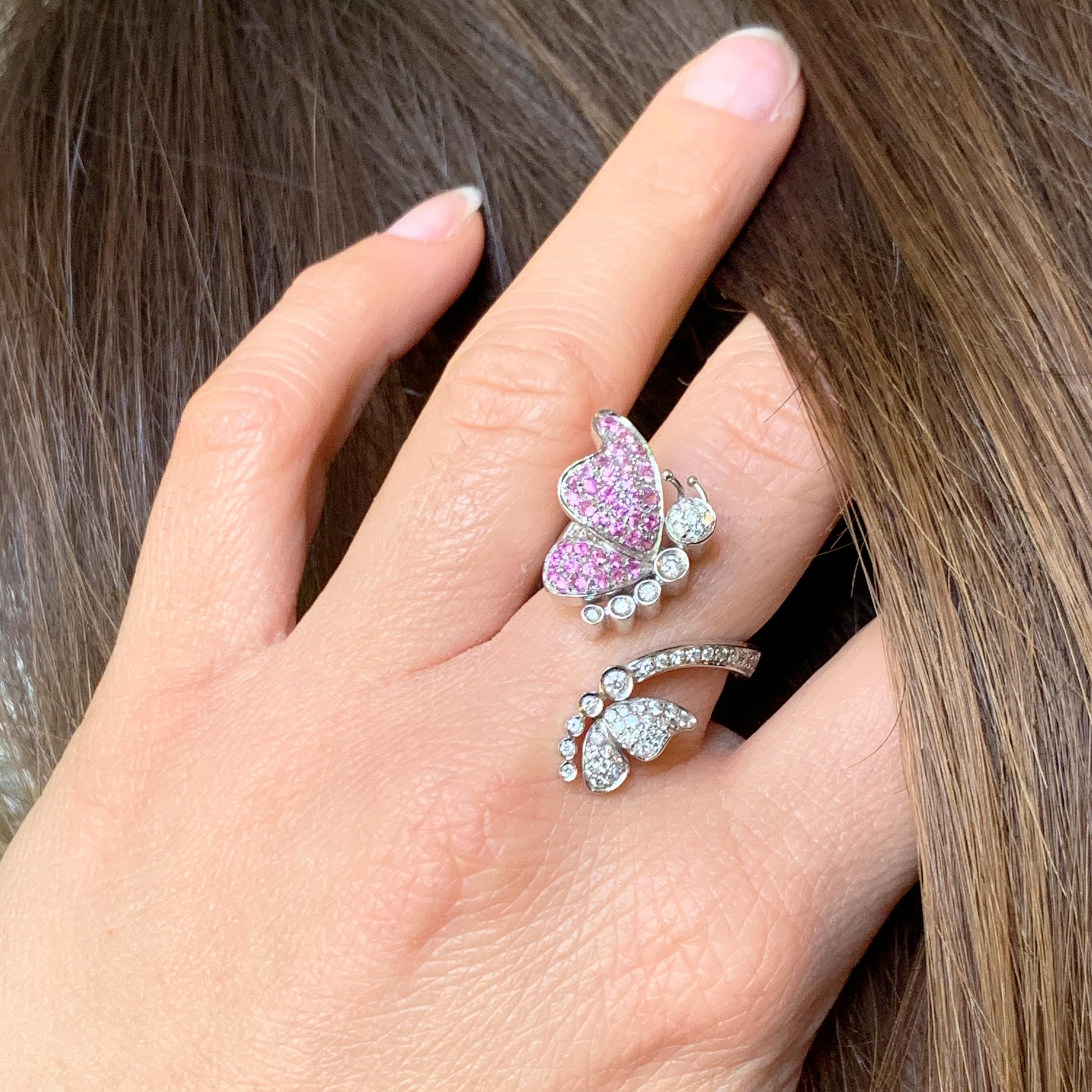 18 Karat Gold Pink Sapphire and Diamond Butterfly Ring fine jewel.
Stunning Italian 18 Kt White Gold Creation, very elegant. Features many pink sapphires and small white diamonds set into the Butterfly wings. This exquisite ring is adorned by the
