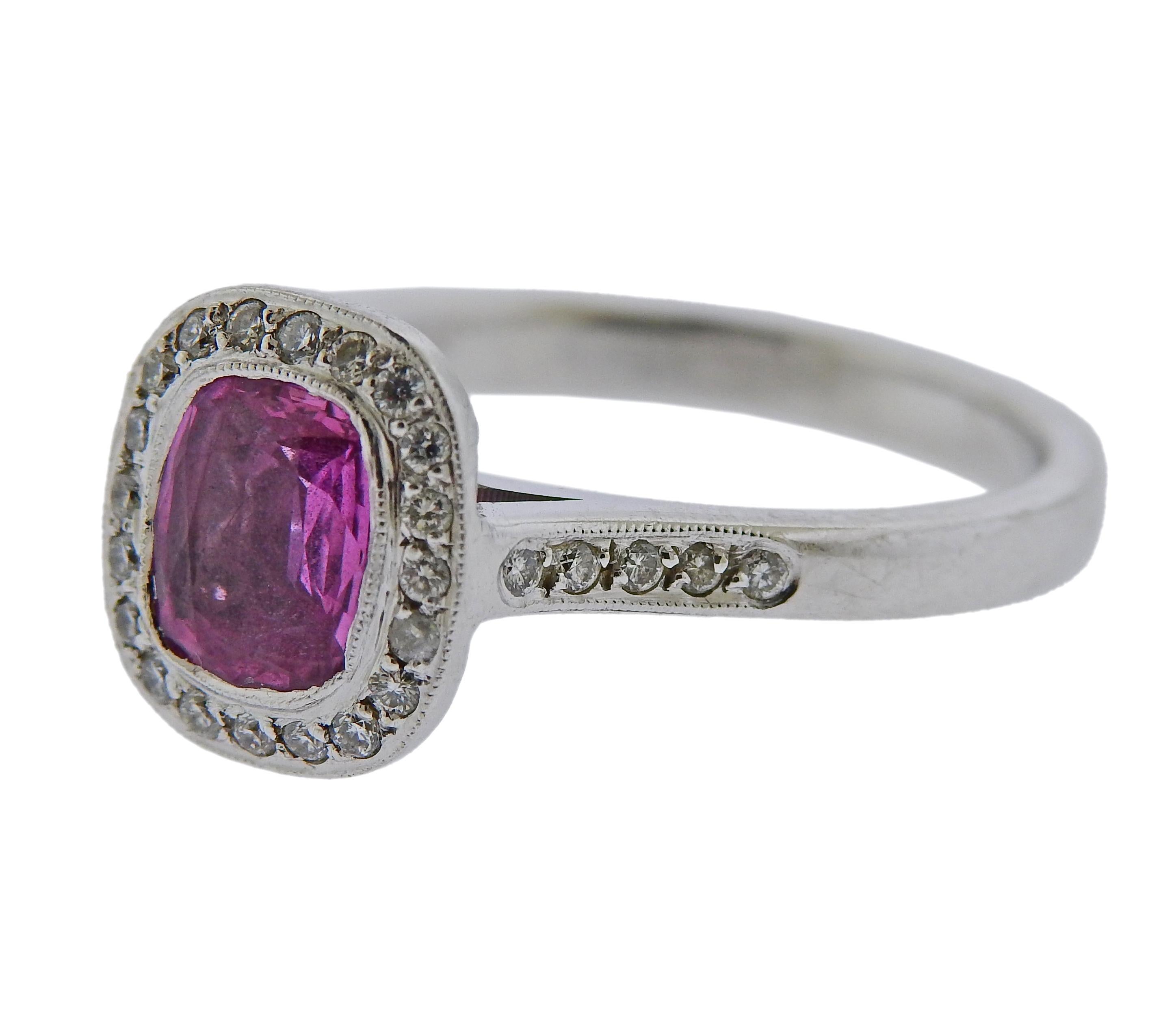 14k white gold engagement ring, set with an approx. 1.41ct pink sapphire, surrounded with diamonds. Ring size 9.25, ring top - 12mm x 10.7mm. MArked 14k. Weighs 6.2 grams.

SKU#R-03003
